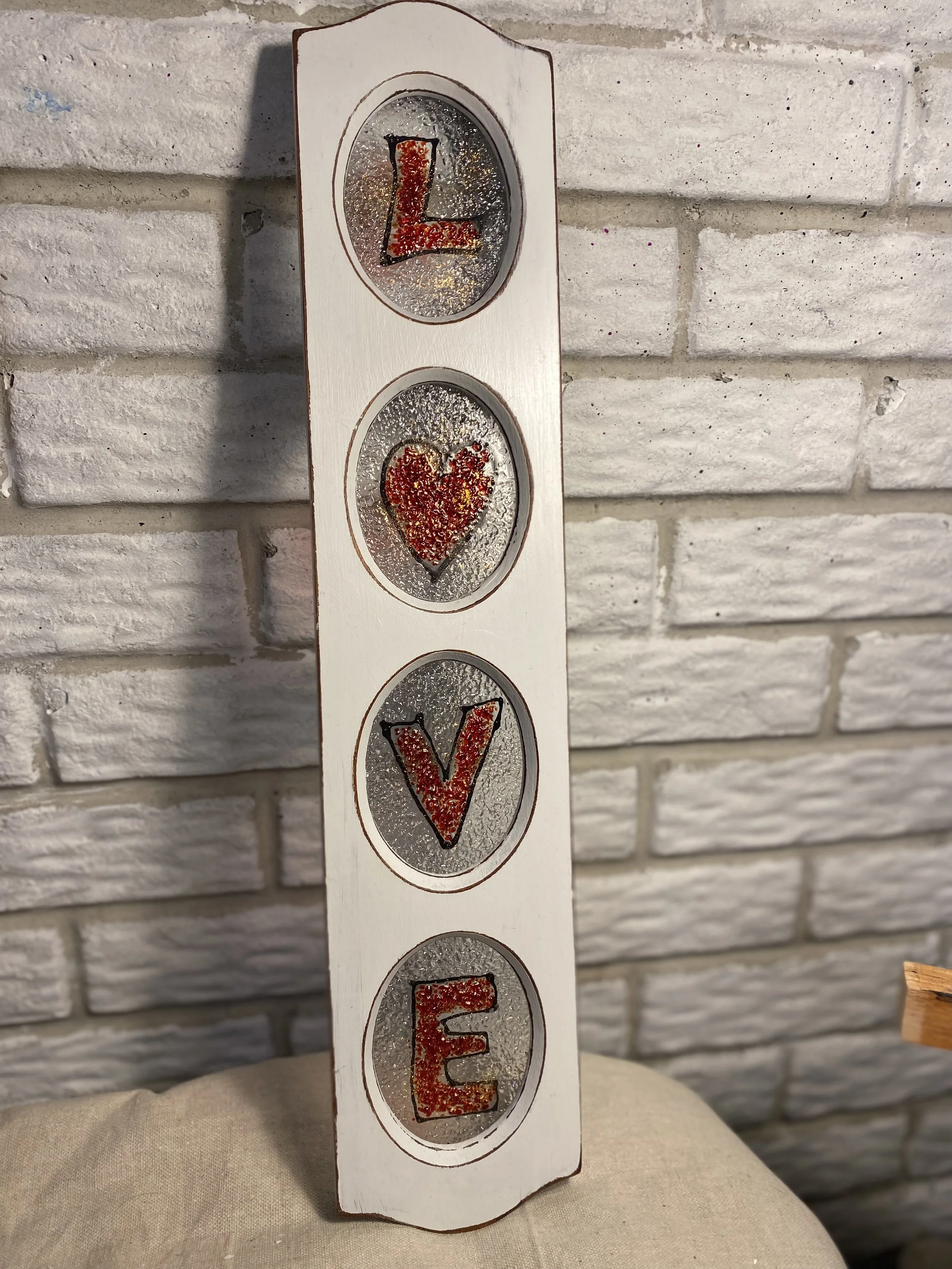 Love - Glass fusion in frame. 23 x 7. $70