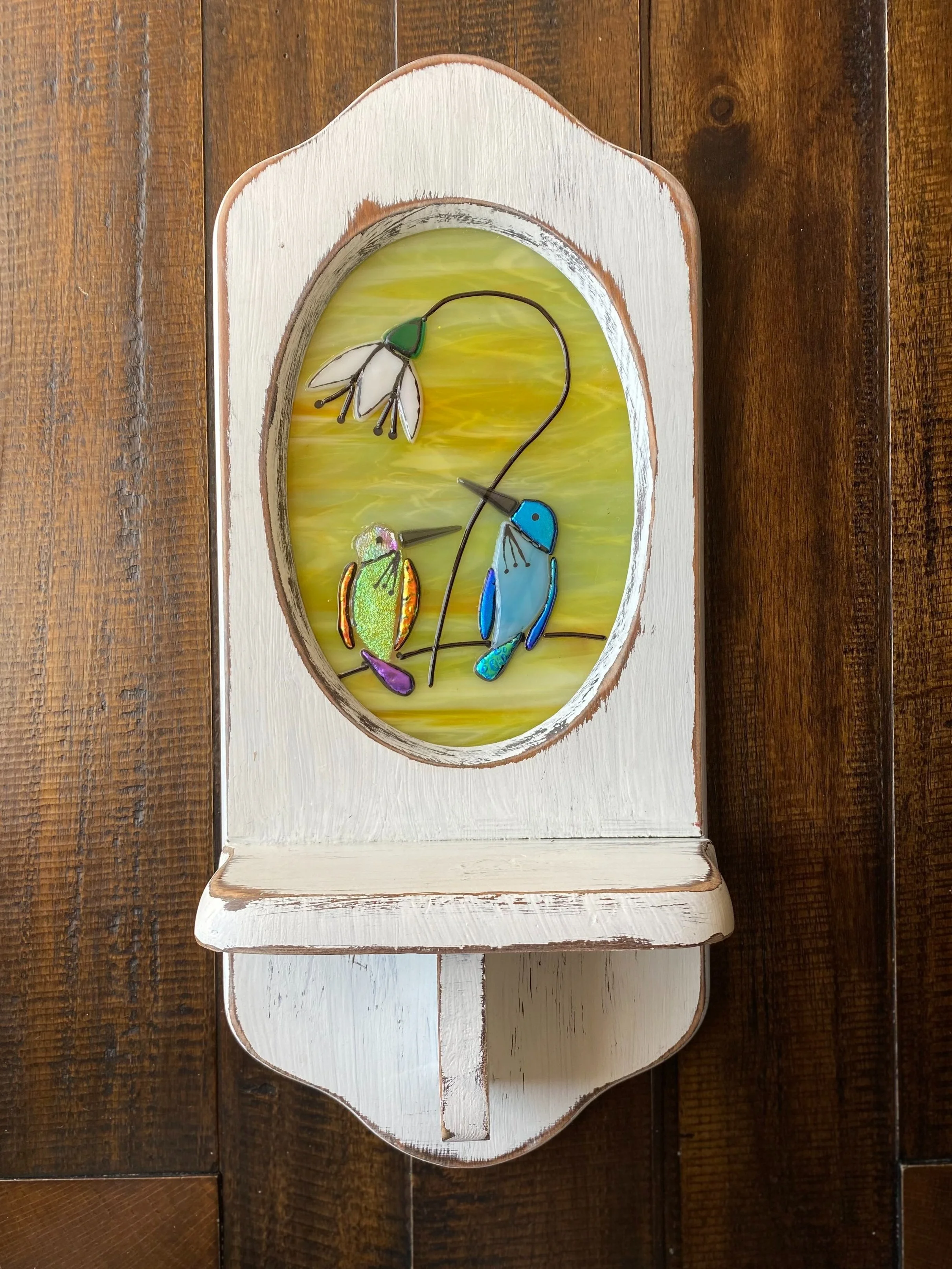 Hummingbird in frame $65