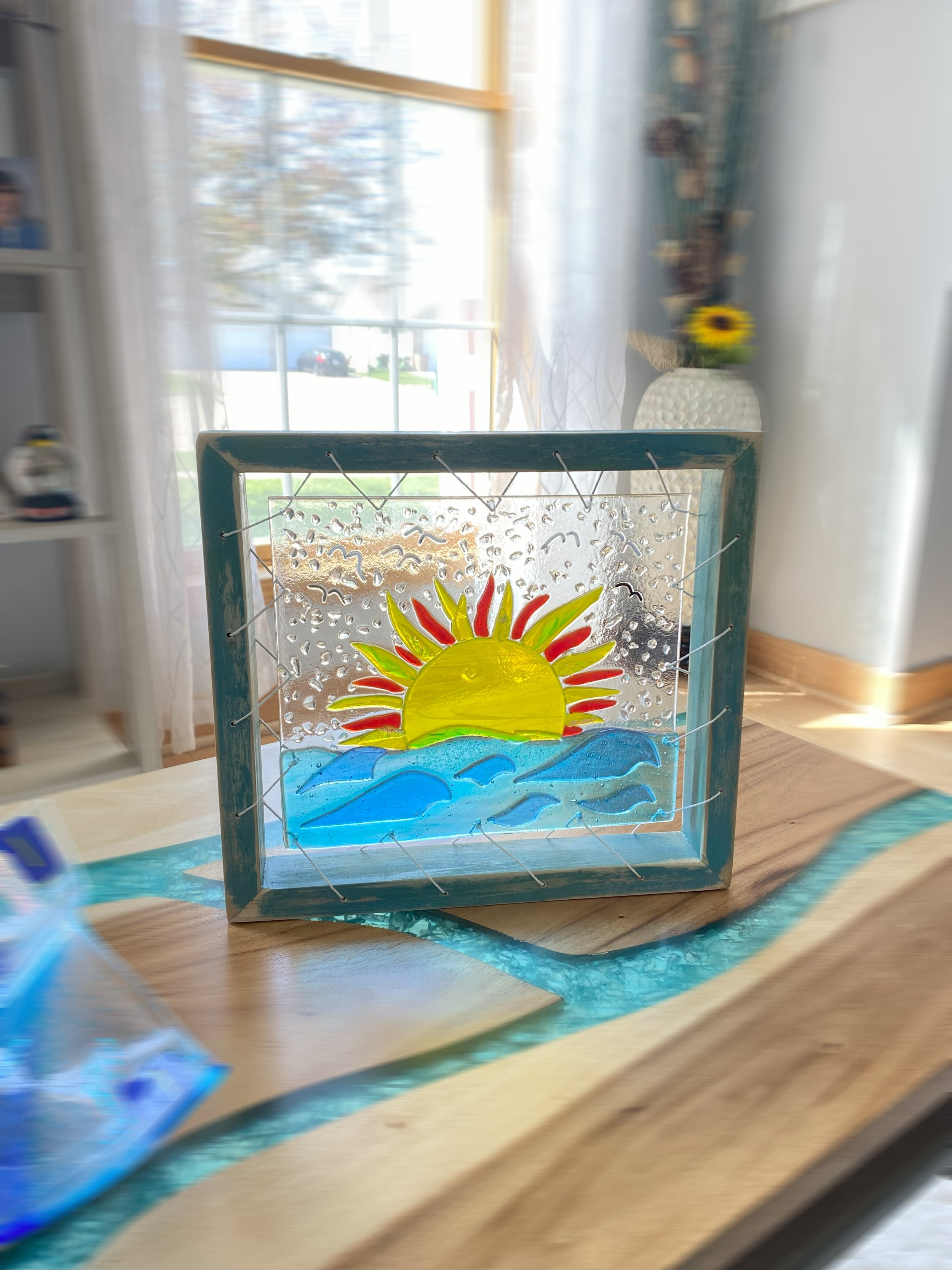 Ocean Sun in signature frame. 12 x 12 $80
