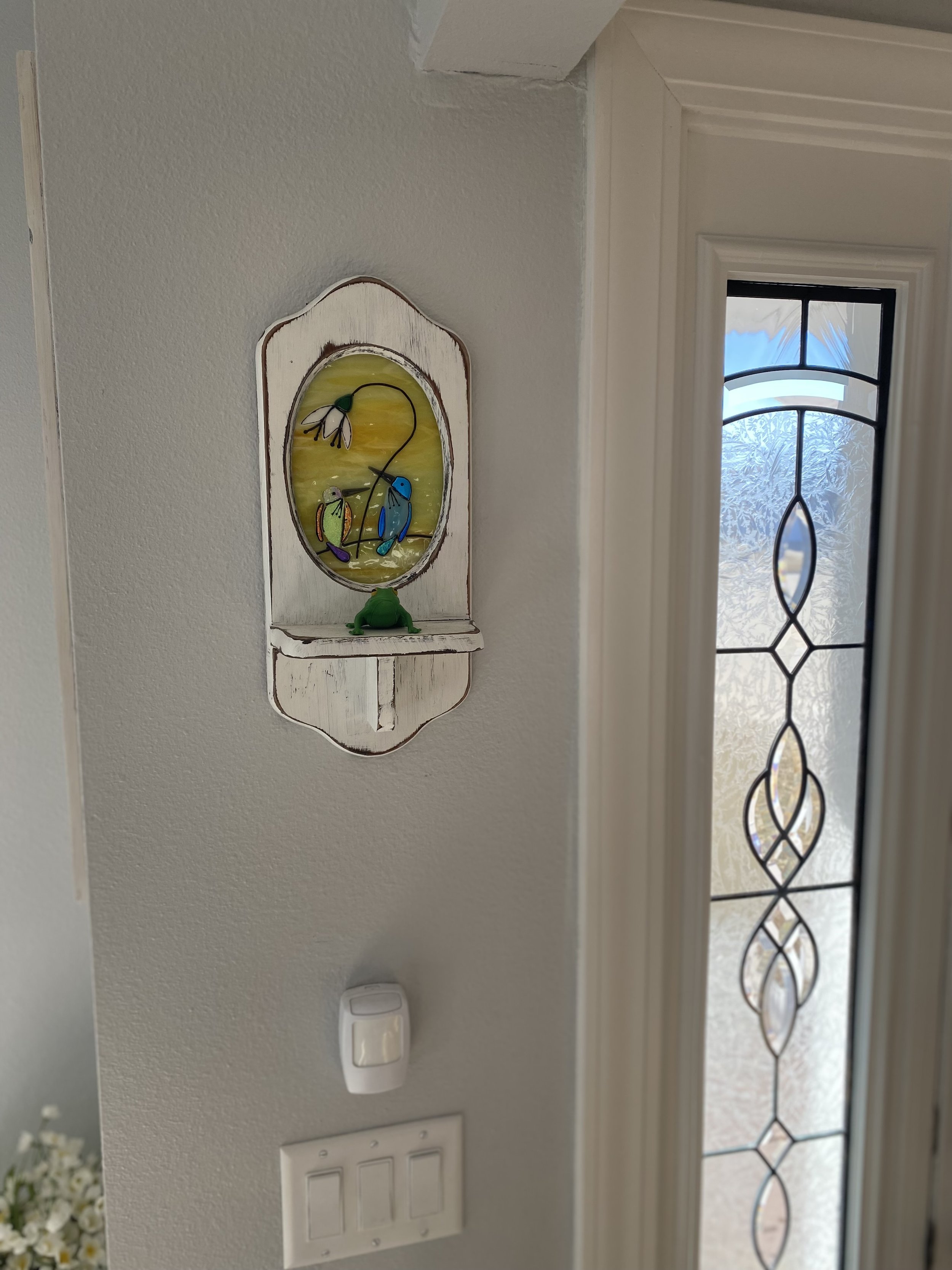 Hummingbird in frame $65