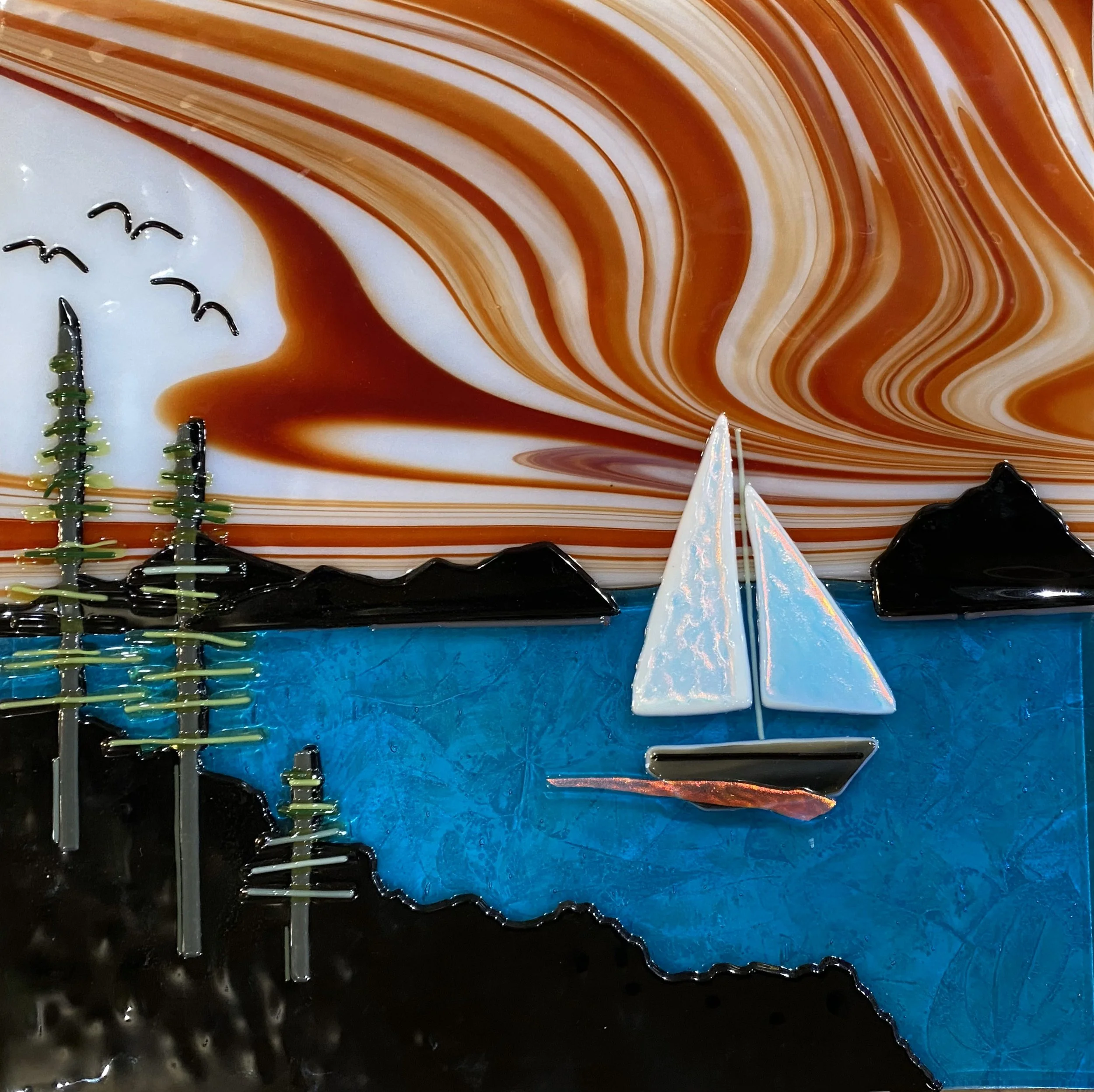 Sunset Sailboat with signature frame 18 x 18 in size. $165