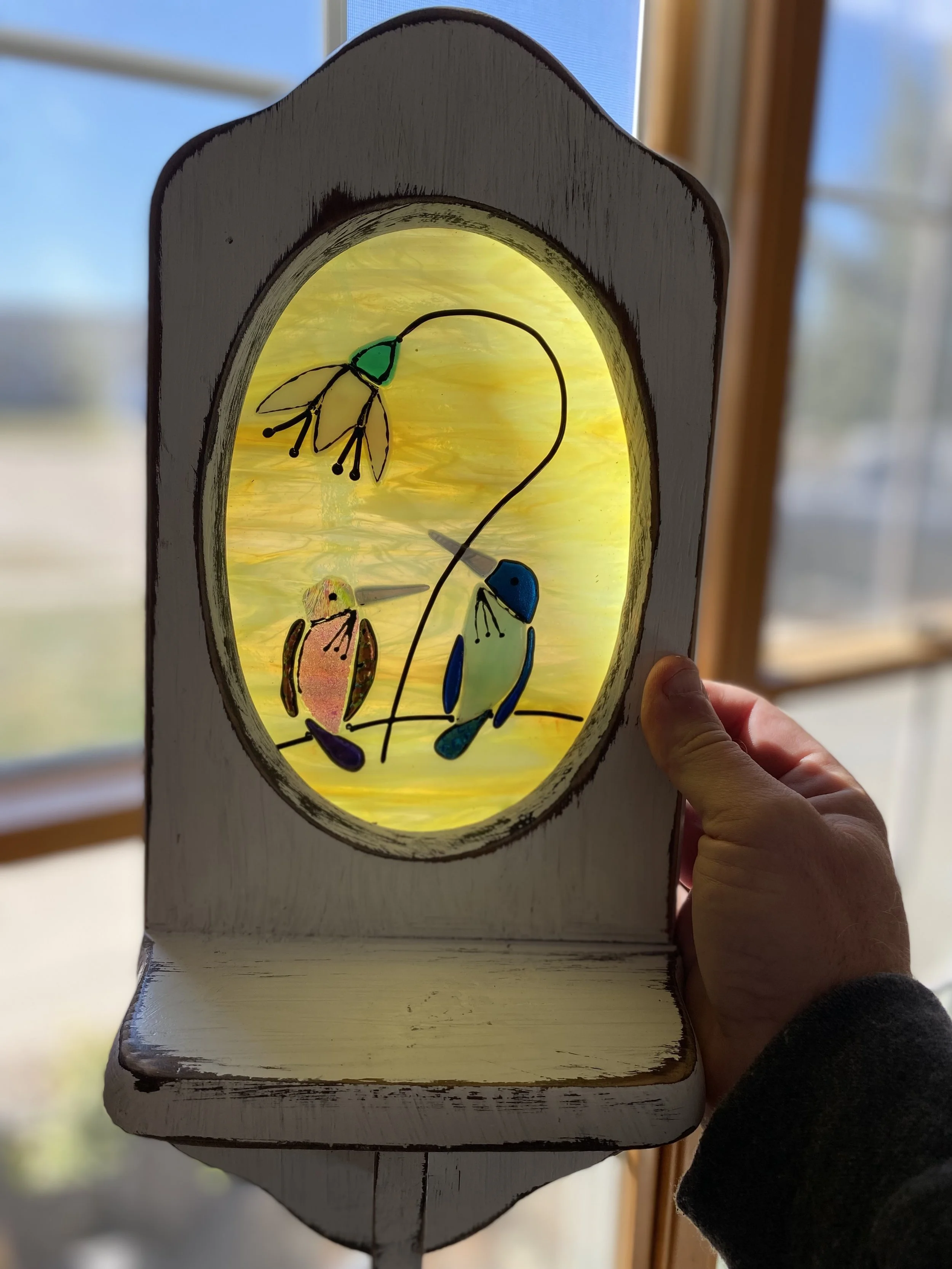 Hummingbird in frame $65