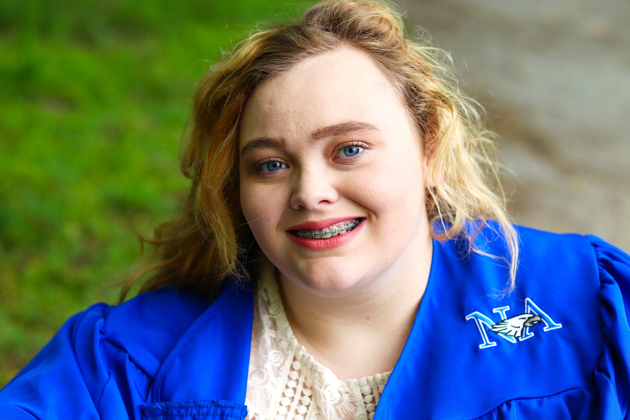 other seated closeup grass dirt background.jpg
