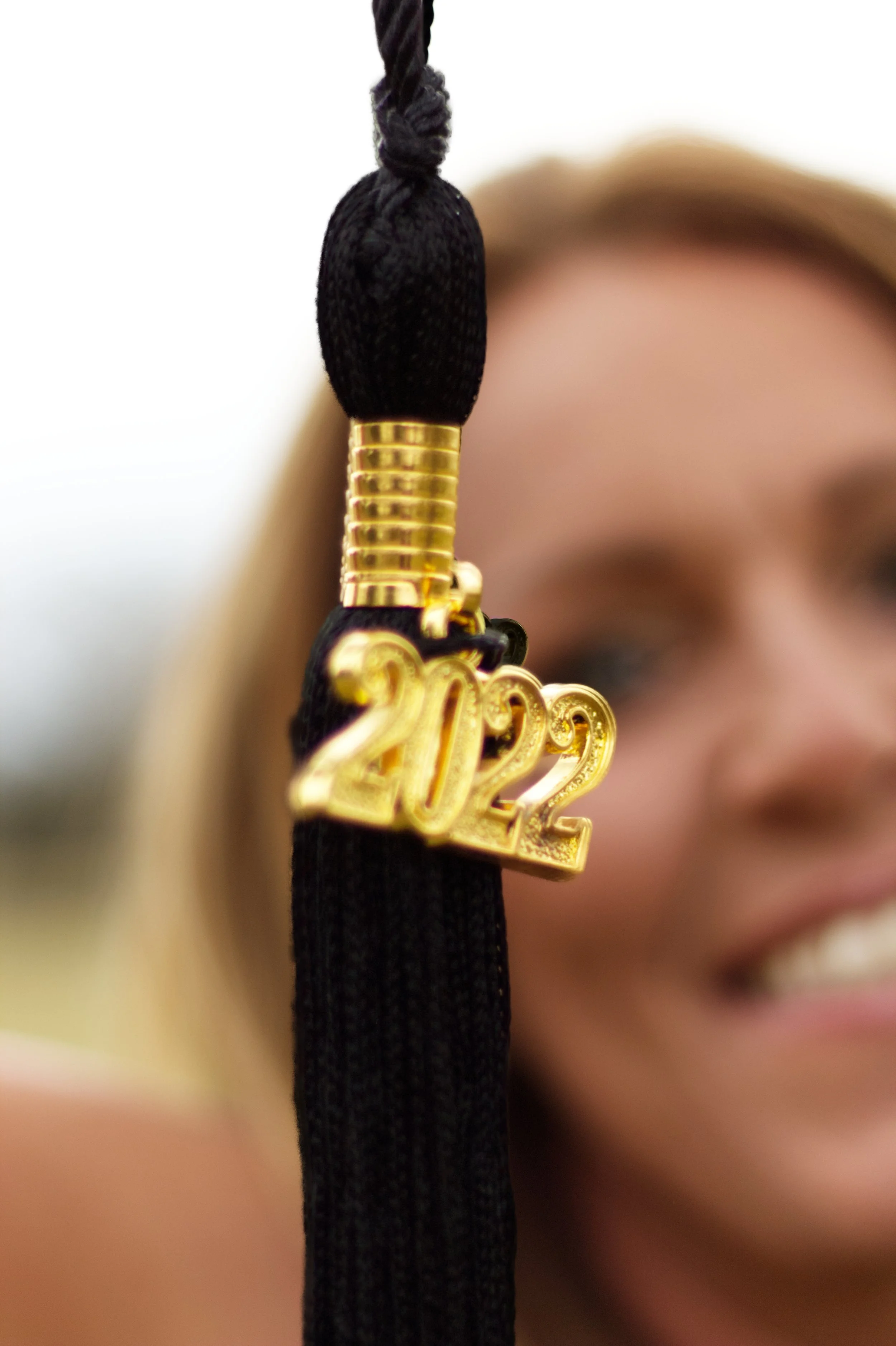 dee tassle front of face.jpg