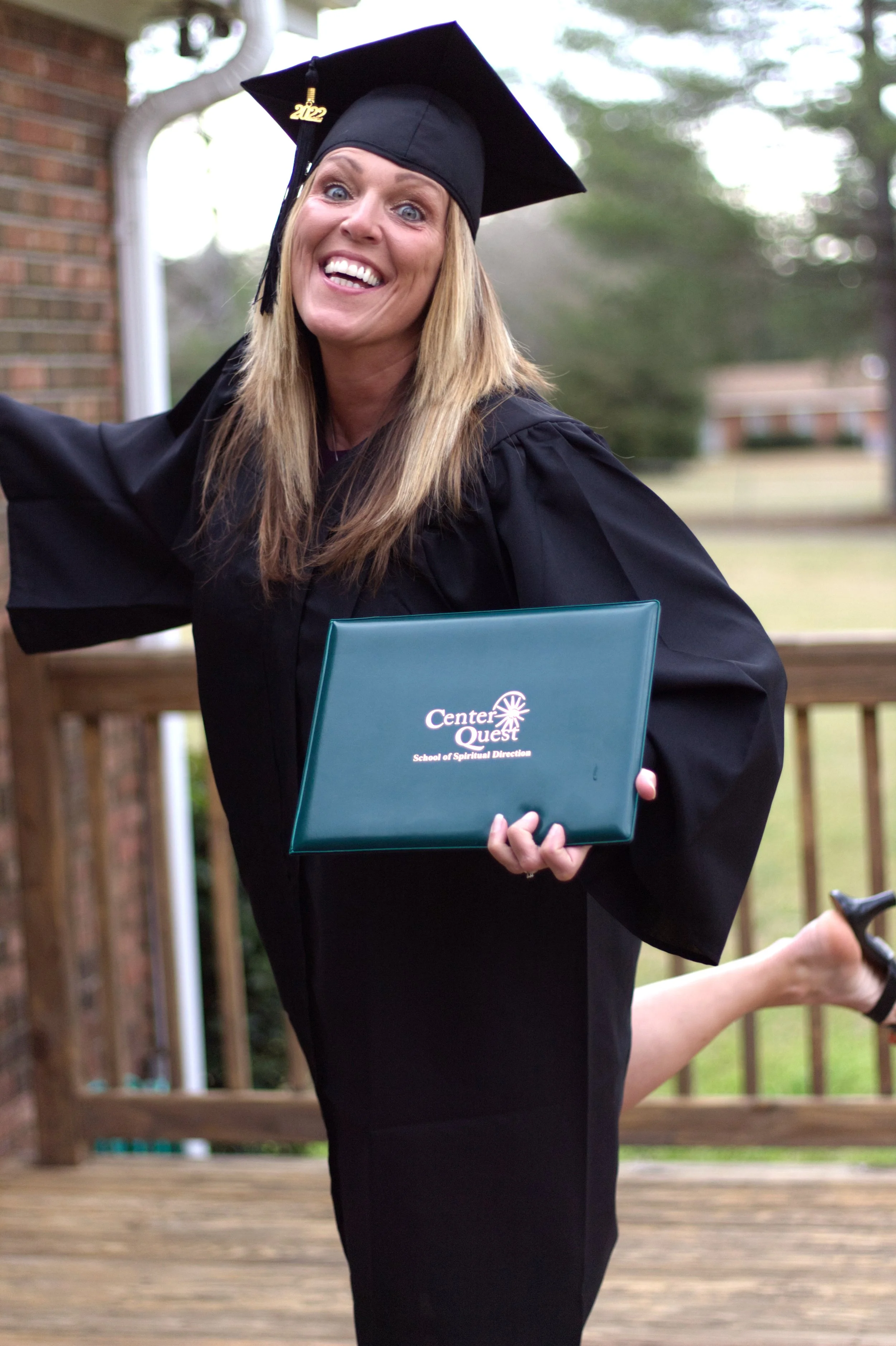 dee leg up holding degree.jpg