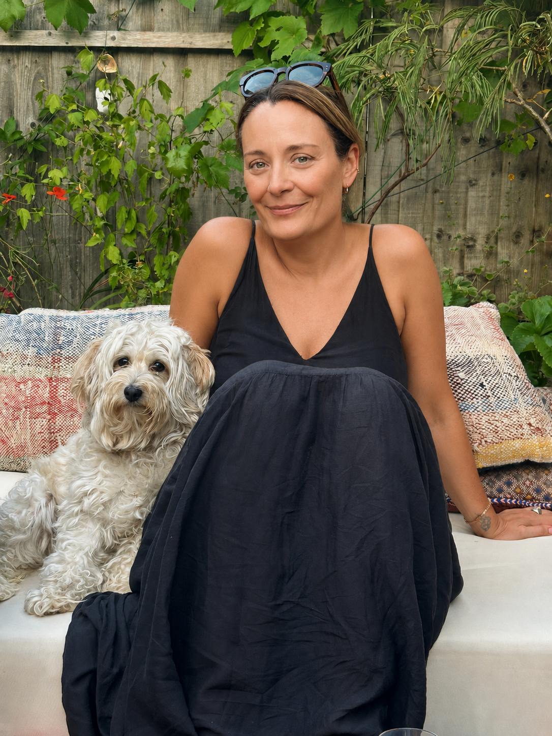 Becky health coach sitting in the garden
