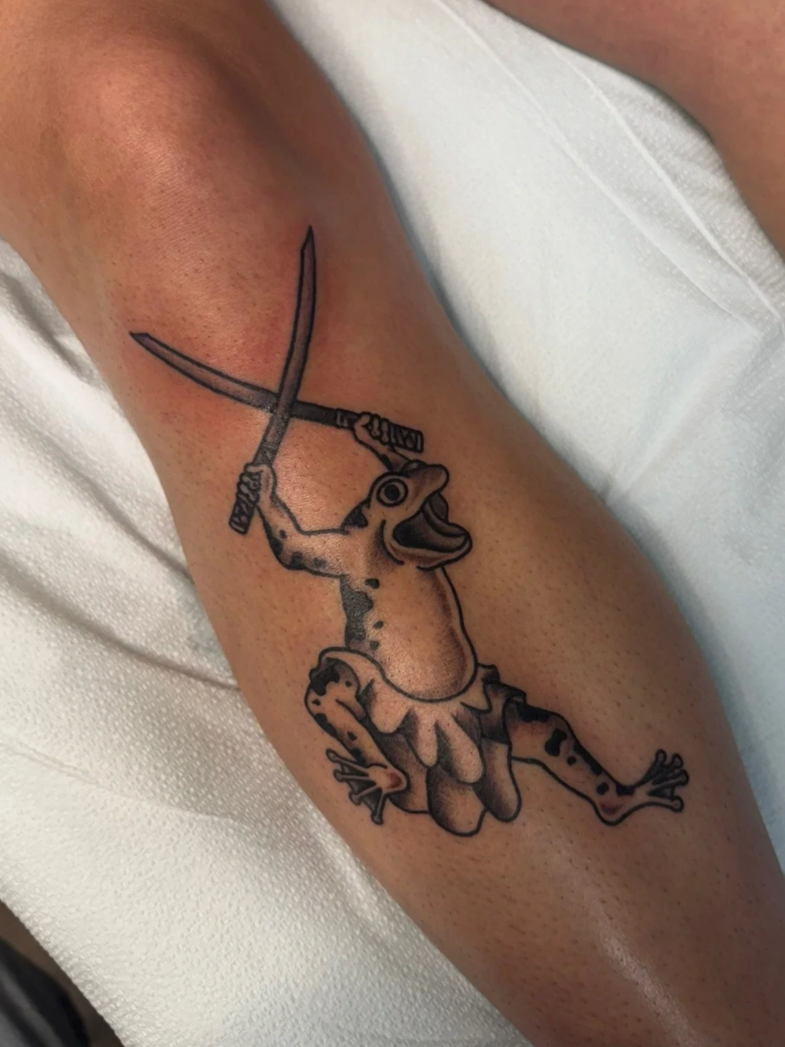 Frog knight tattoo in black and gray ink by Leah Fries, located at Moth to a Flame Tattoo, Colorado Springs
