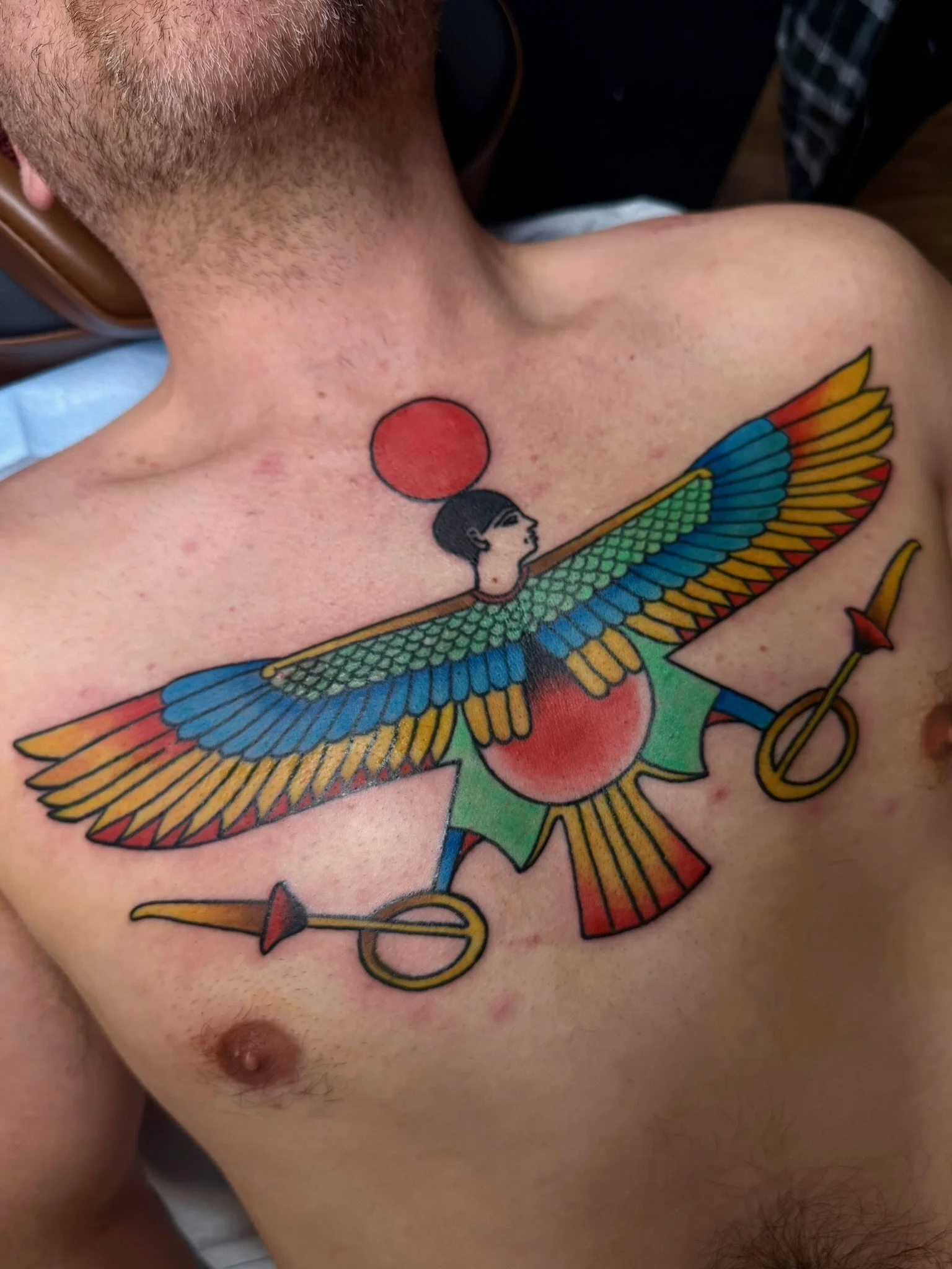 Full chest piece tattoo in full color ink by Leah Fries located in Old Colorado City