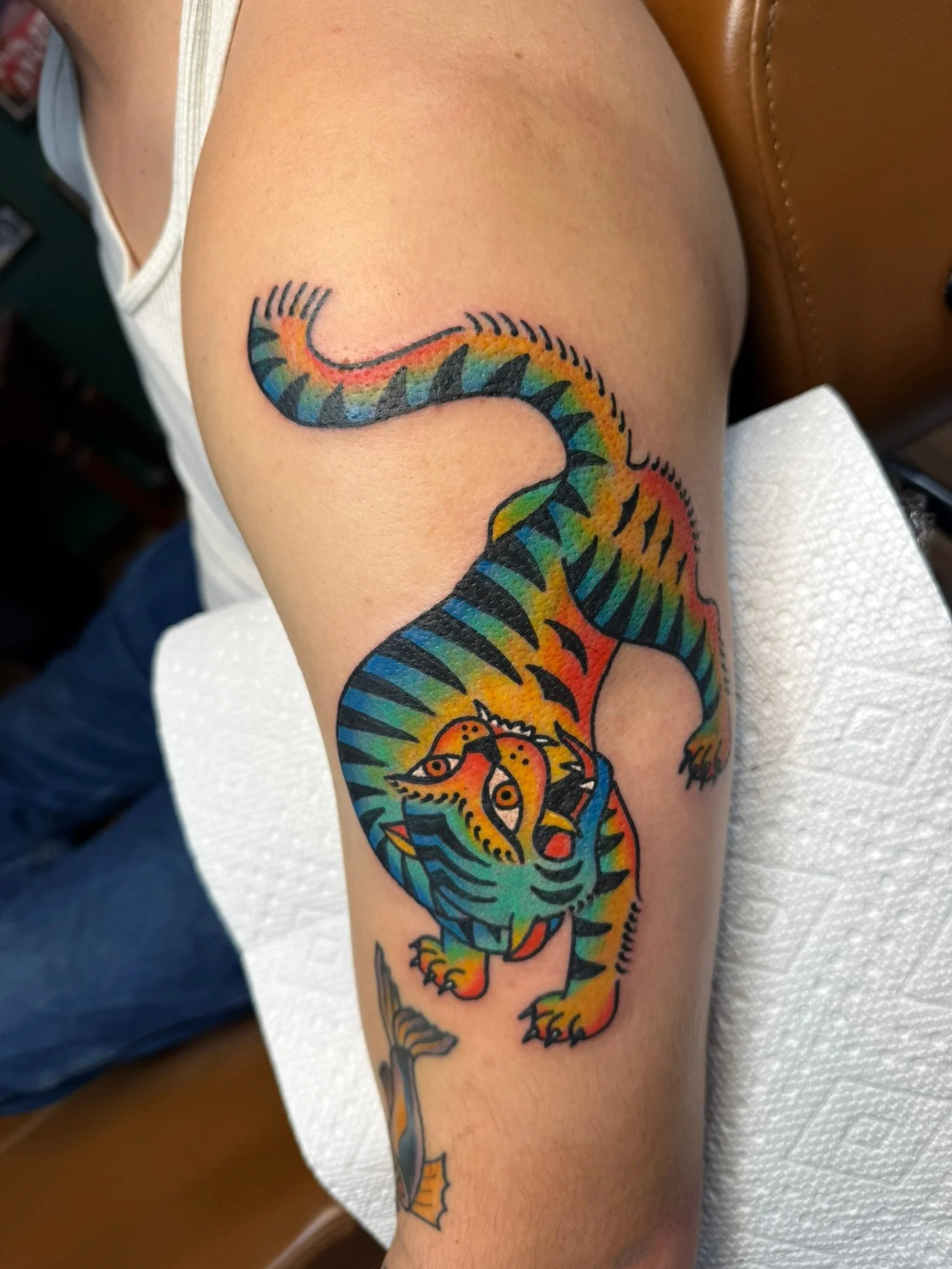Surrealist tiger tattoo in full color ink by Leah Fries located in Colorado Springs