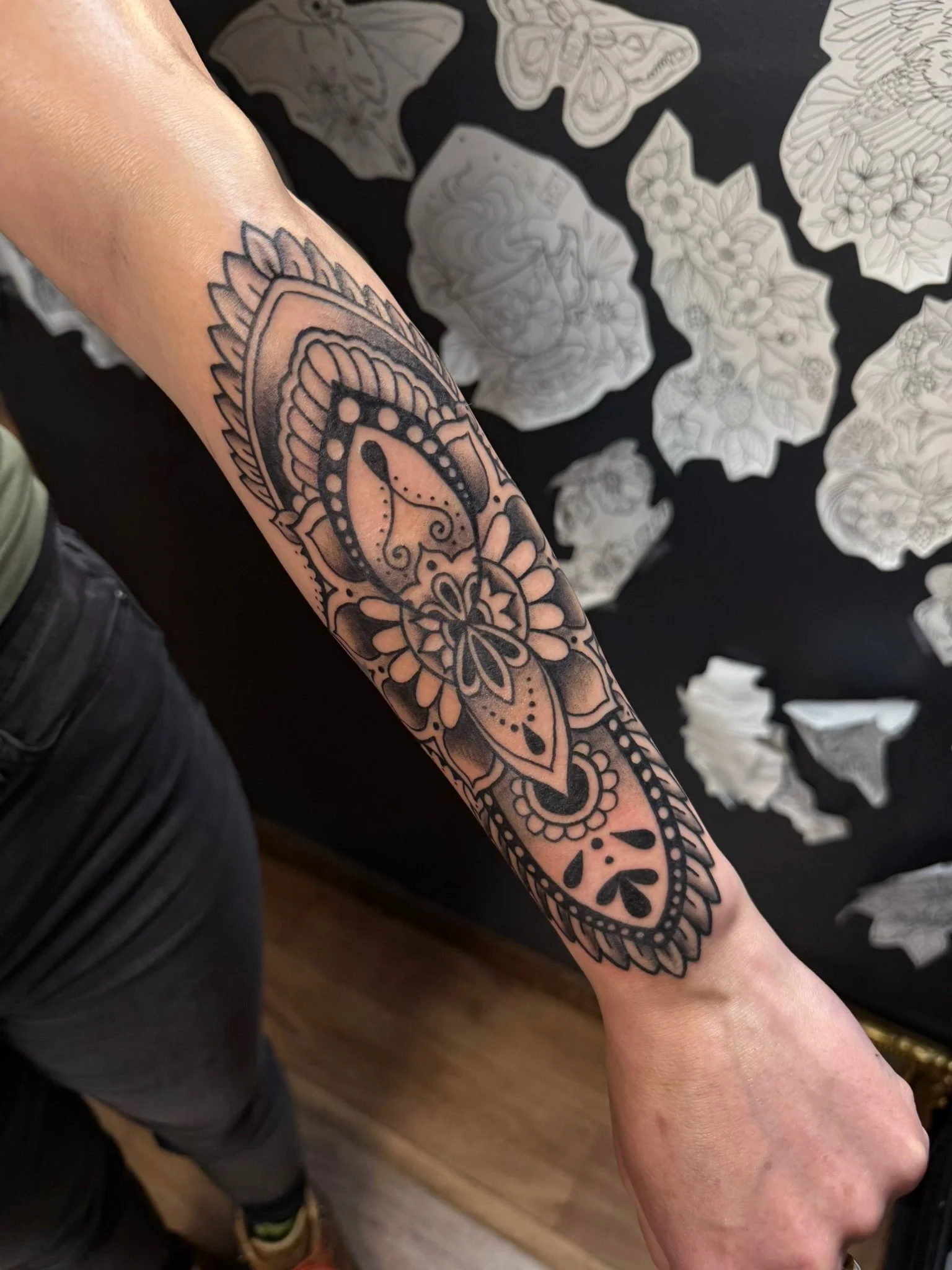 Mandala tattoo quarter sleeve in black and gray ink by Leah Fries, located at Moth to a Flame Tattoo, Old Colorado City