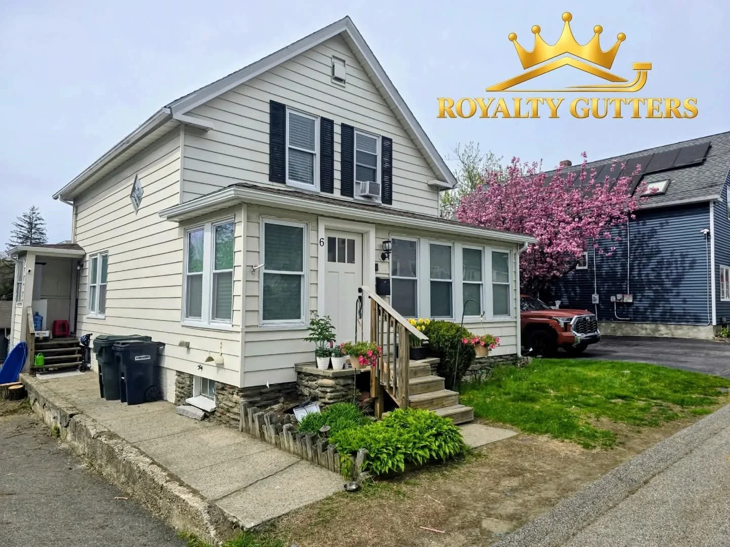 5-inch white aluminum seamless gutters installed in Auburn Massachusetts