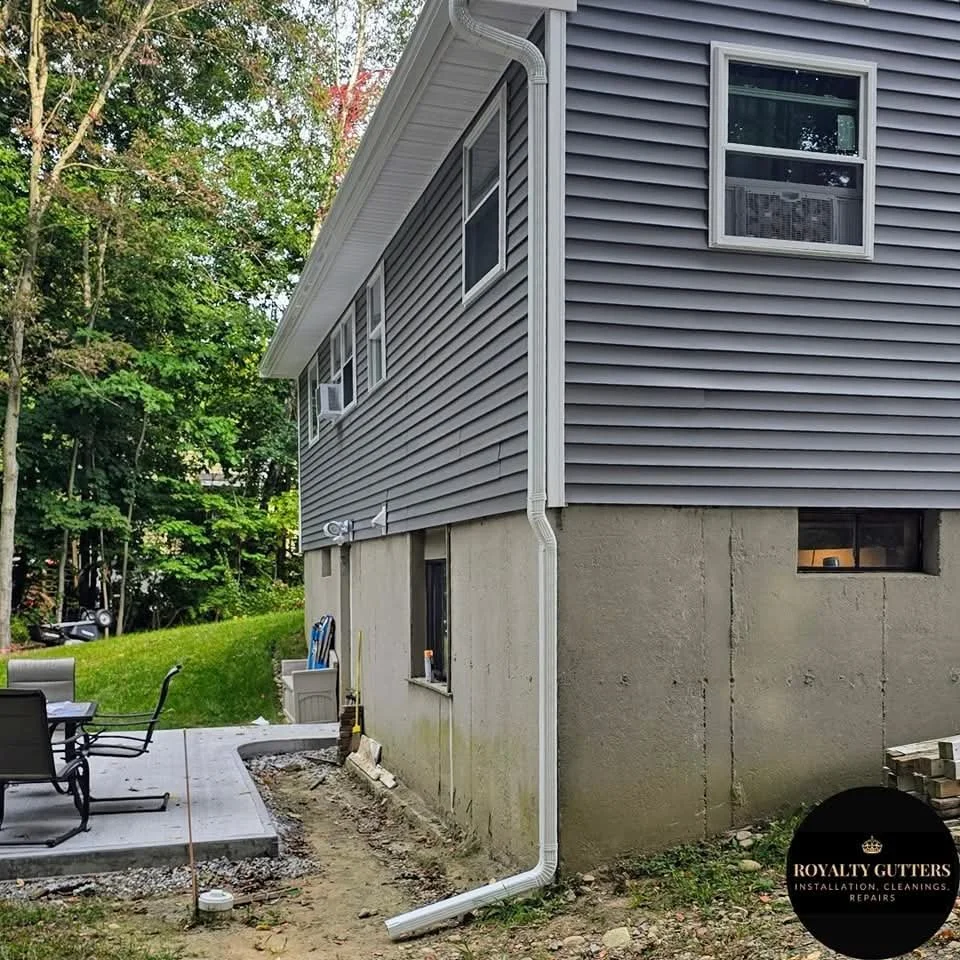 Royalty Gutters installs downspout in Auburn, MA