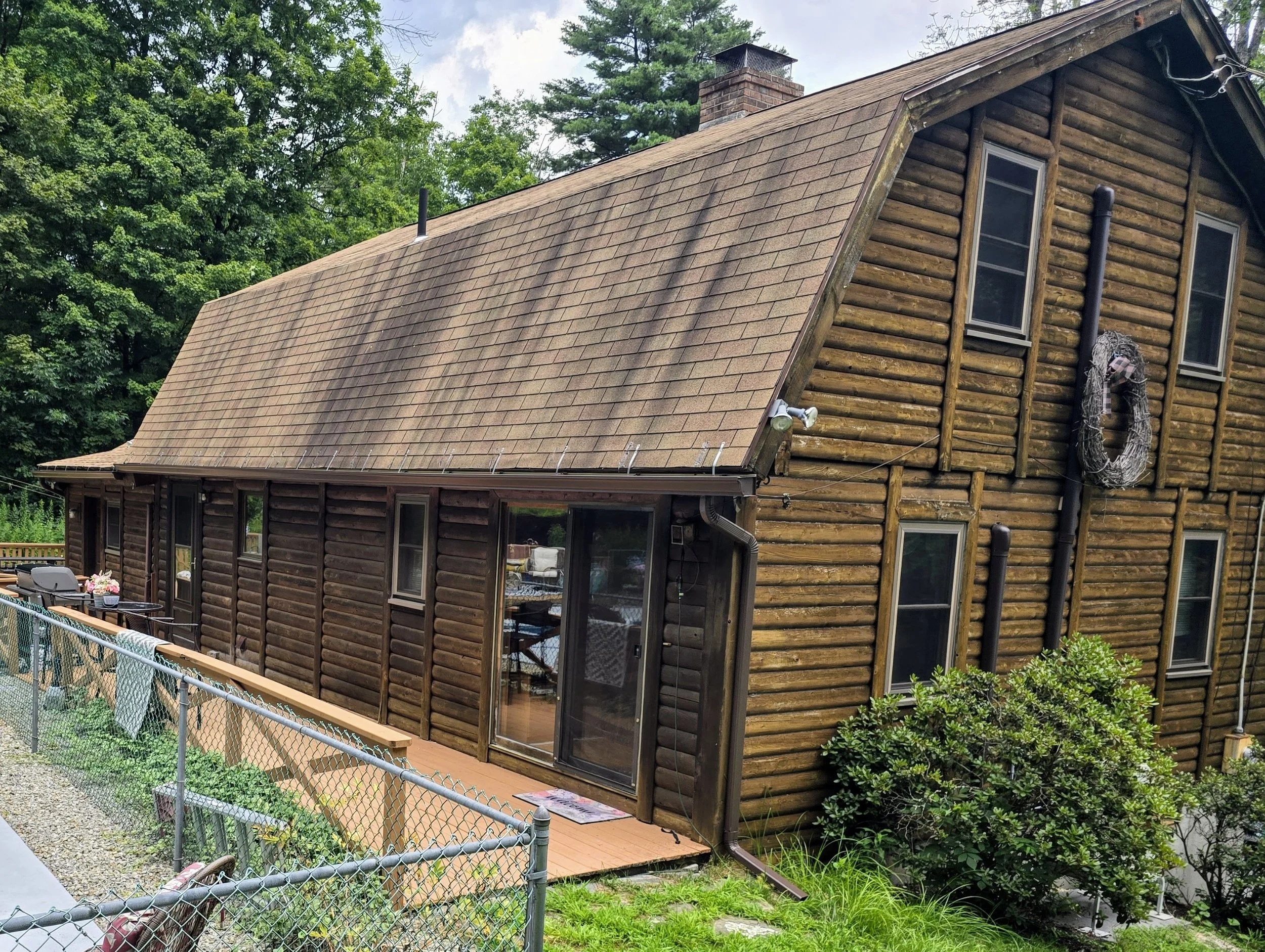 Seamless Classic Brown Gutter Installation in Sturbridge, MA