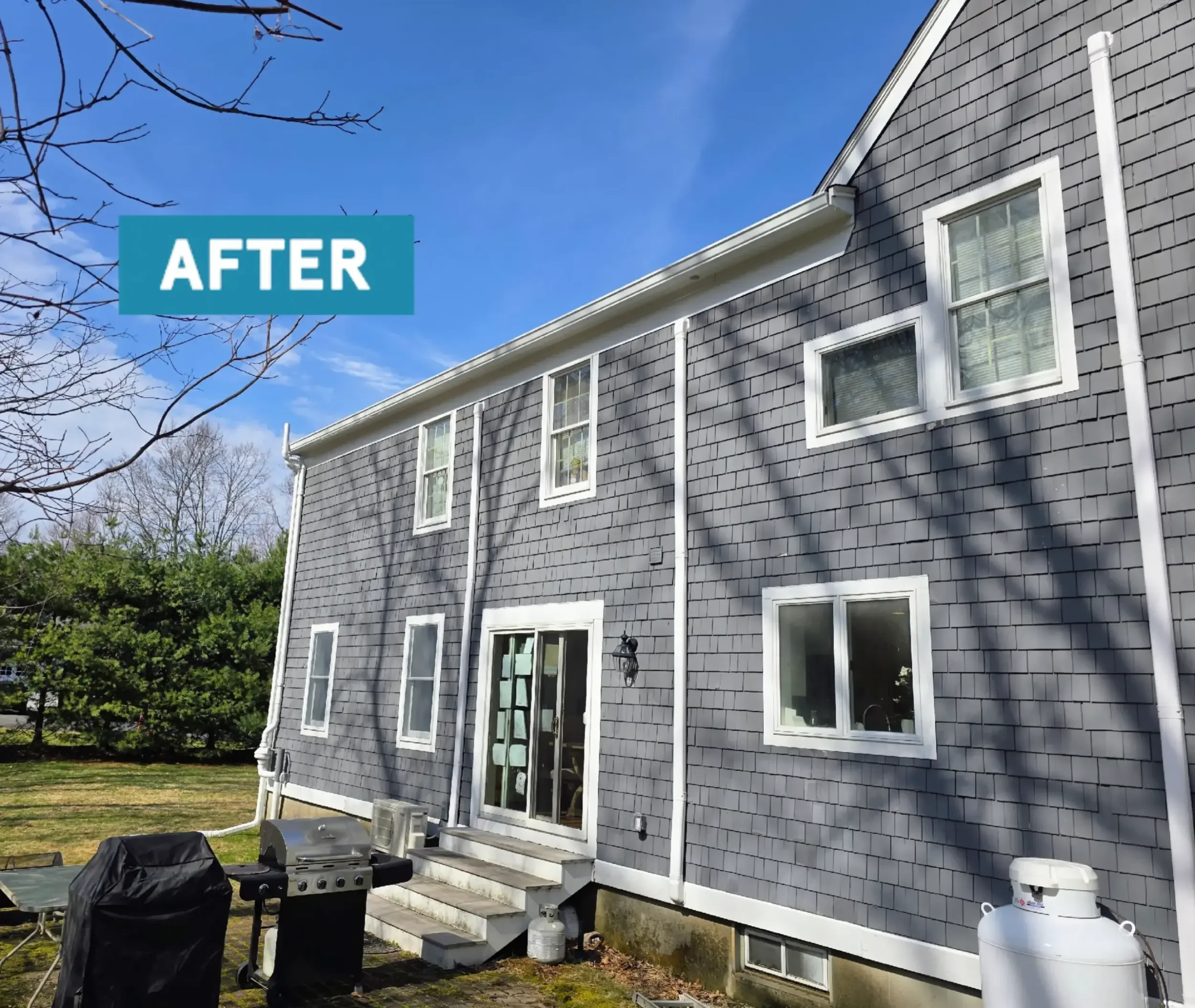 Before & after in Shrewsbury, MA 6" white aluminum seamless gutters with oversized 3x4 downspouts. Royalty Gutters LLC 2026