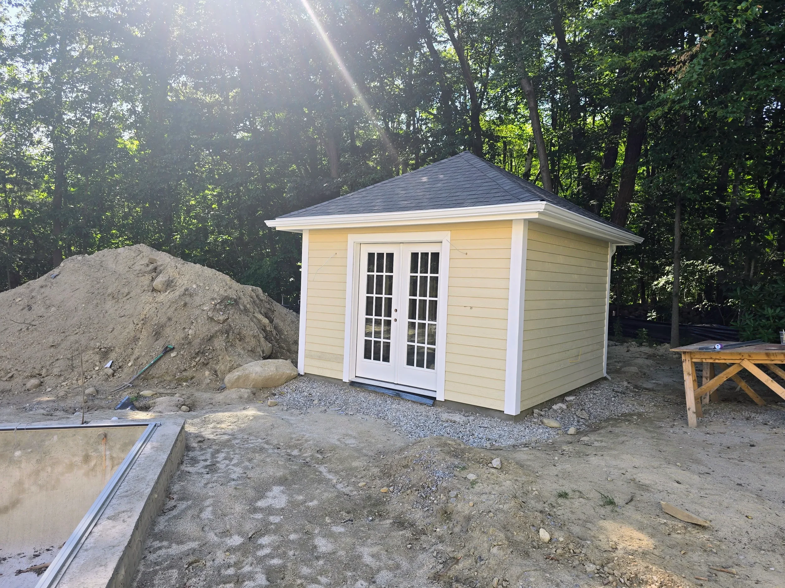 365ft of white 5-inch .032-gauge aluminum seamless gutters with hidden hangers, micro-mesh gutter screening, 2x3 downspouts, and (14) miters in Shrewsbury, MA | Royalty Gutters LLC