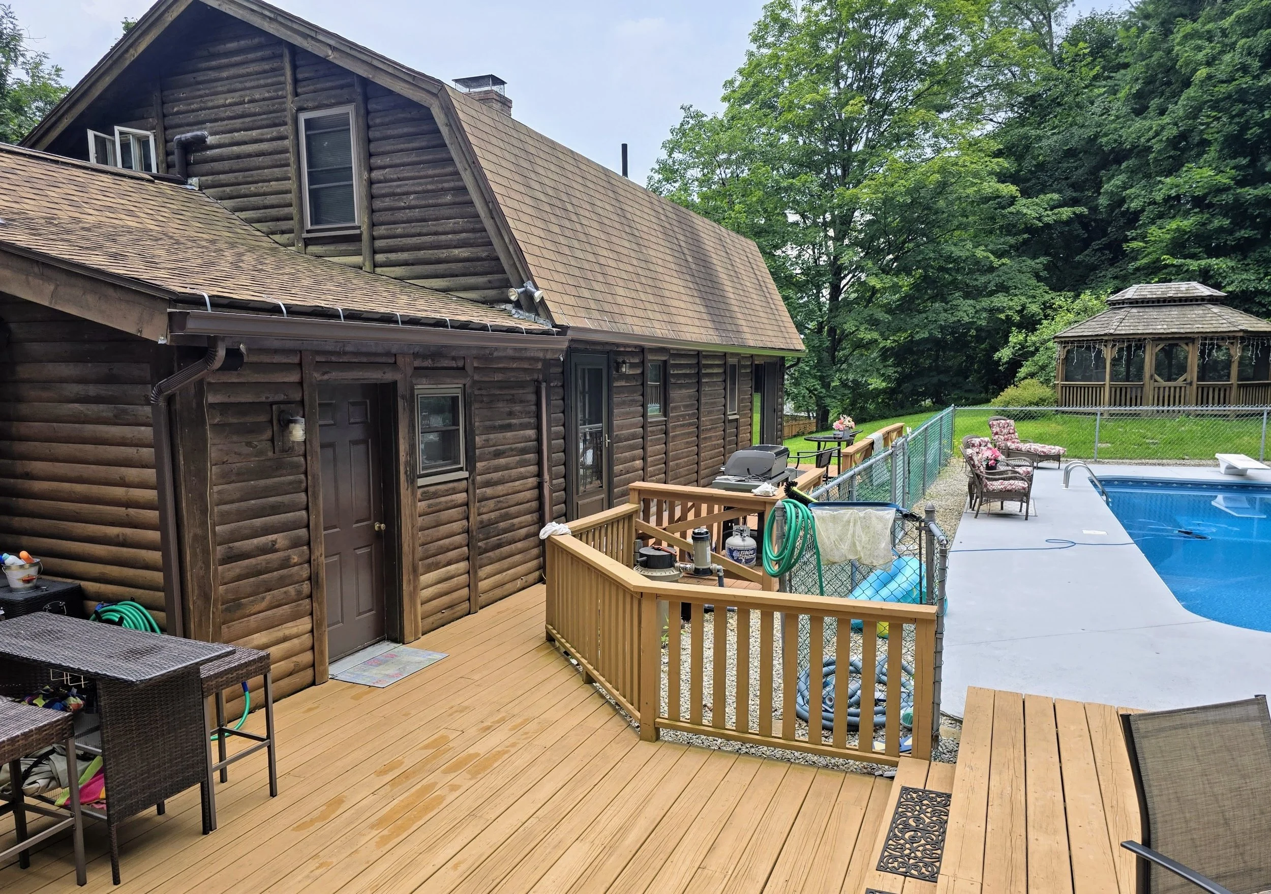 Seamless Classic Brown Gutter Installation in Sturbridge, MA