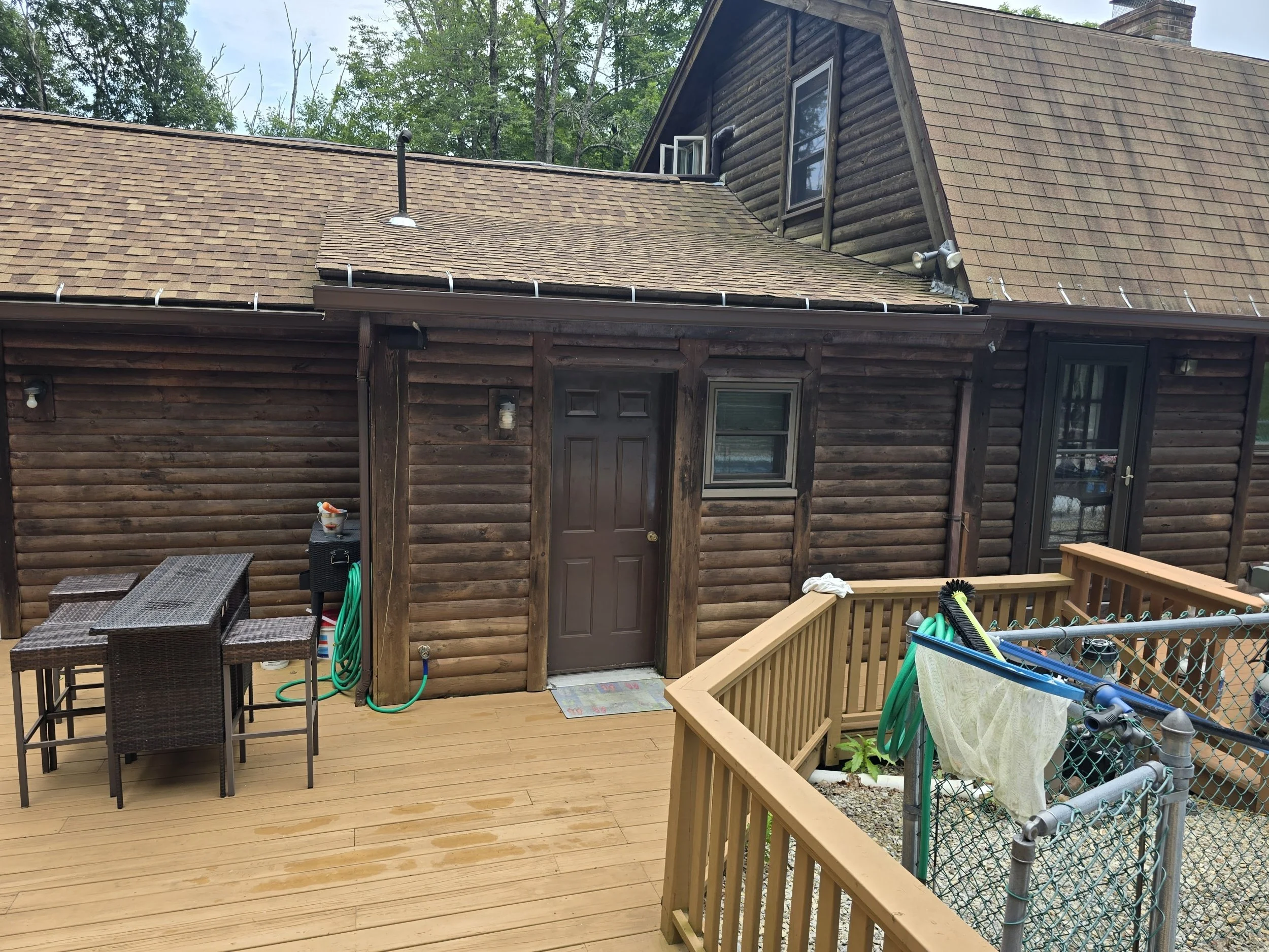 Seamless Classic Brown Gutter Installation in Sturbridge, MA