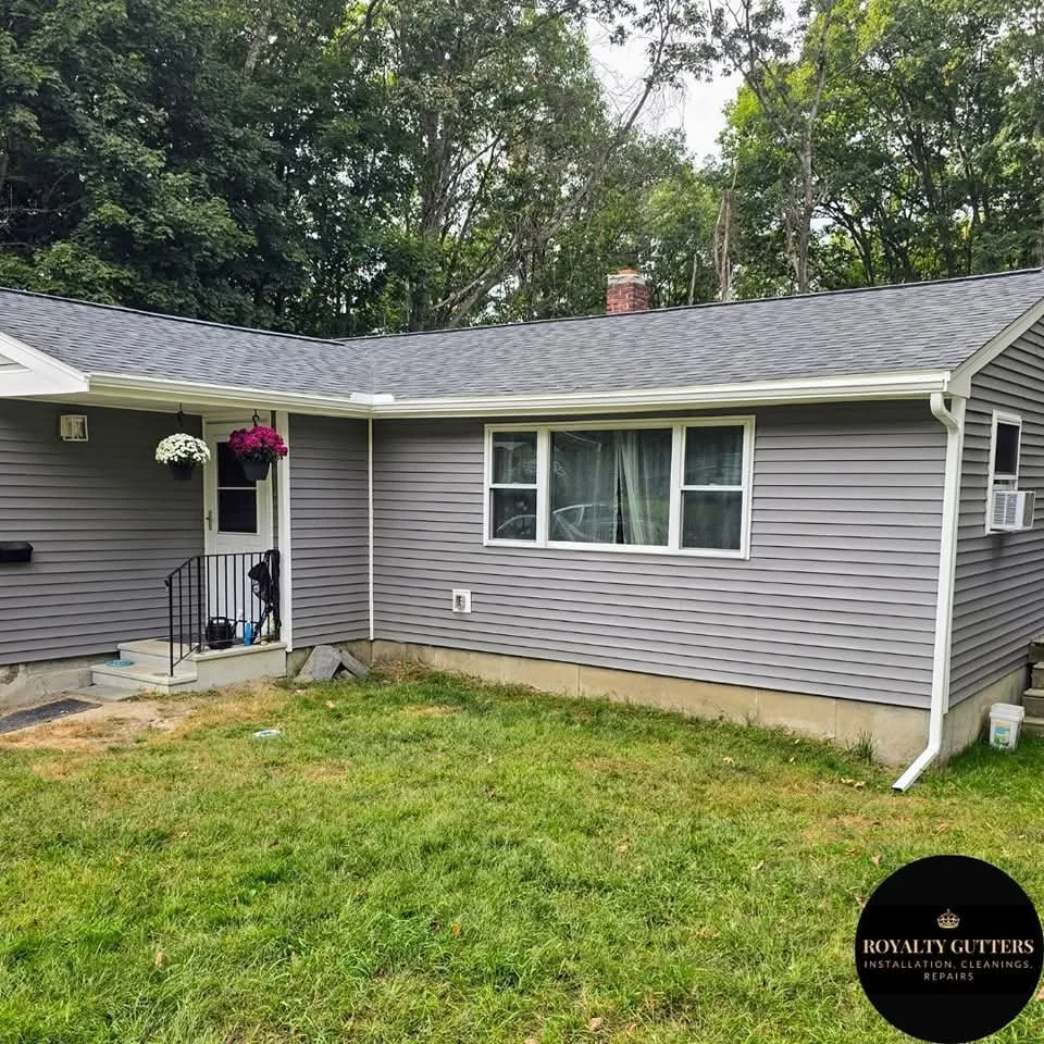Custom seamless gutter and downspout installation on a home in Auburn MA