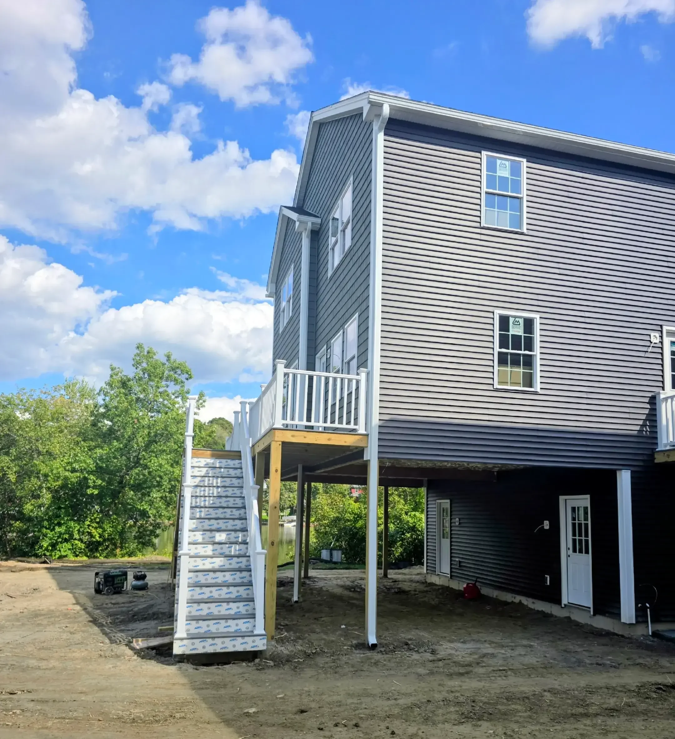 Royalty Gutters LLC in collaboration with J.M. LaBouef General Contracting on Indian Lake in Worcester, MA New Build