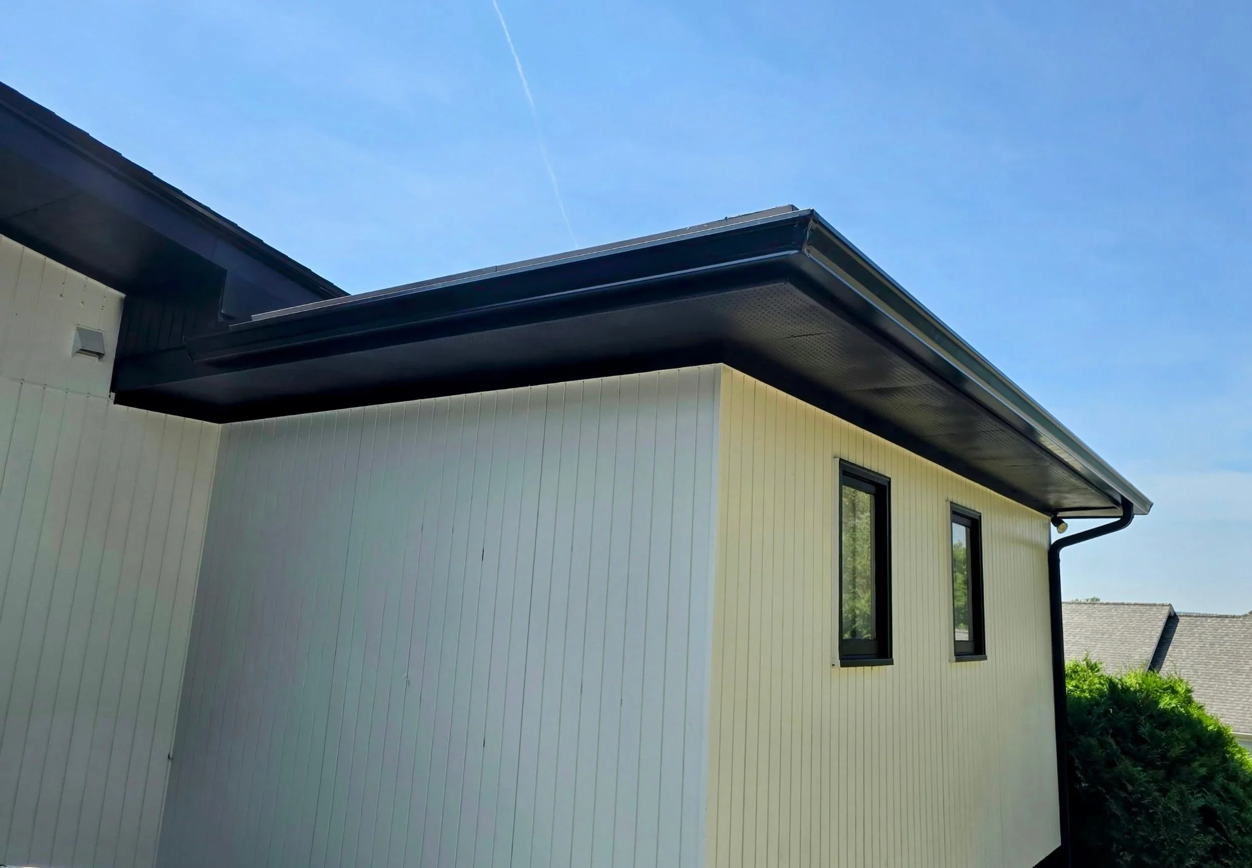 Sleek Black Seamless Gutter Installation in Leominster, MA