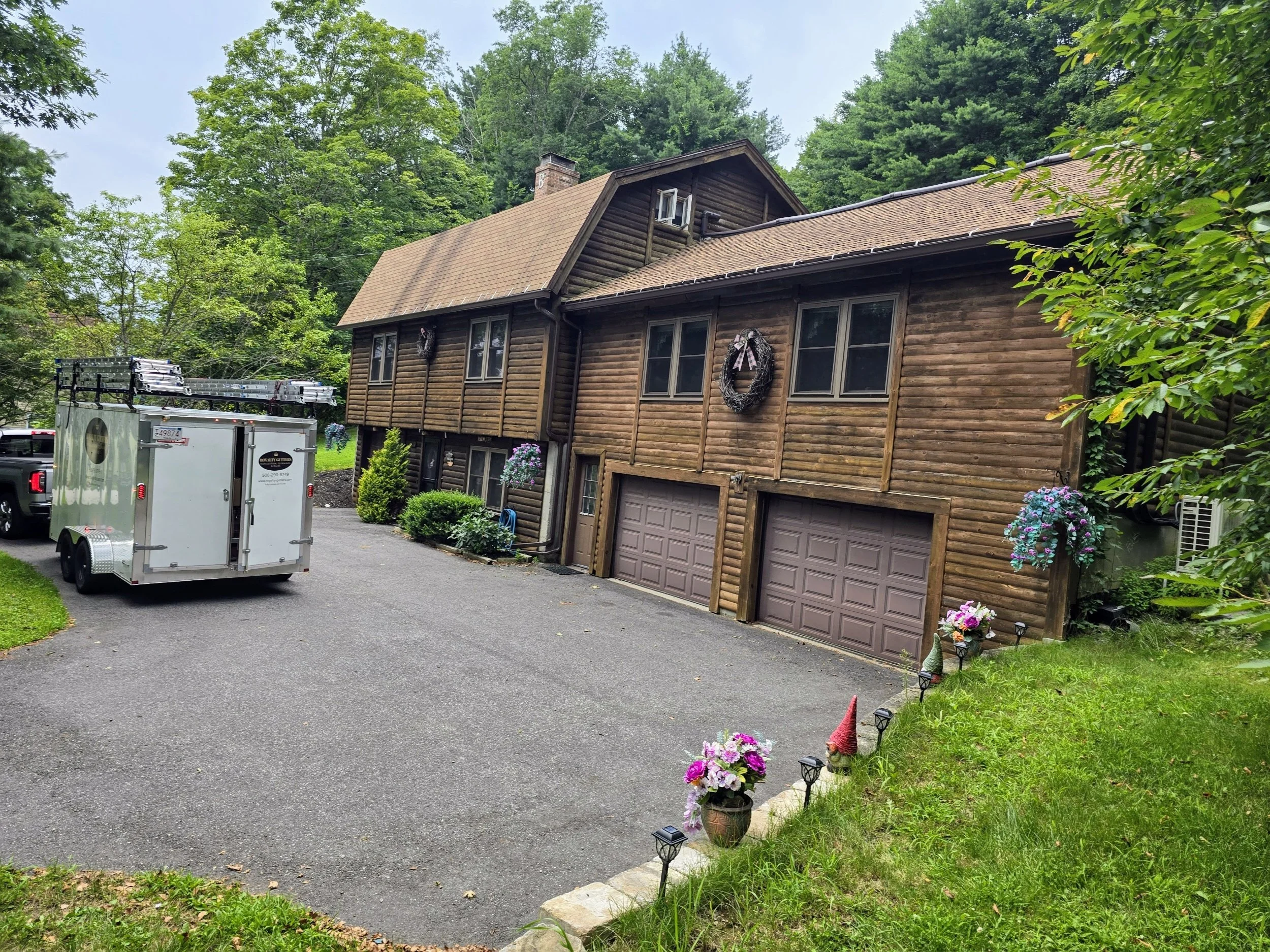 Seamless Classic Brown Gutter Installation in Sturbridge, MA