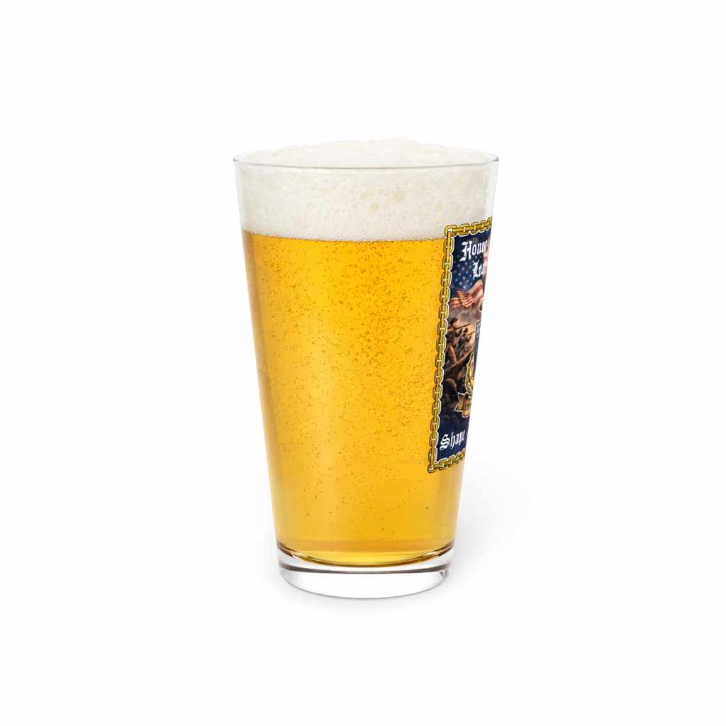 Golden amber beer with ornate label.png