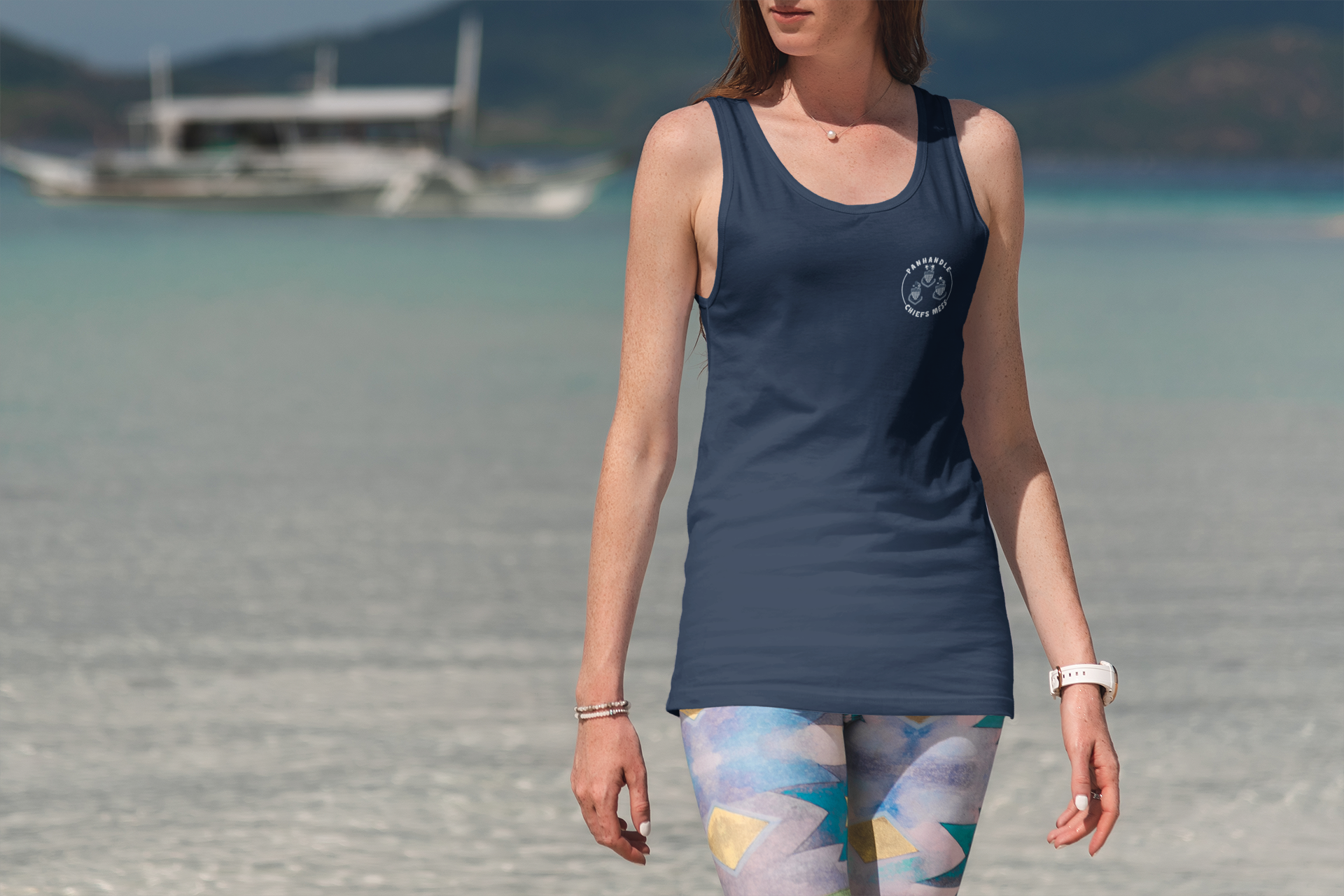 tank-top-mockup-of-a-woman-with-colorful-pants-at-the-beach-3339-el1.png
