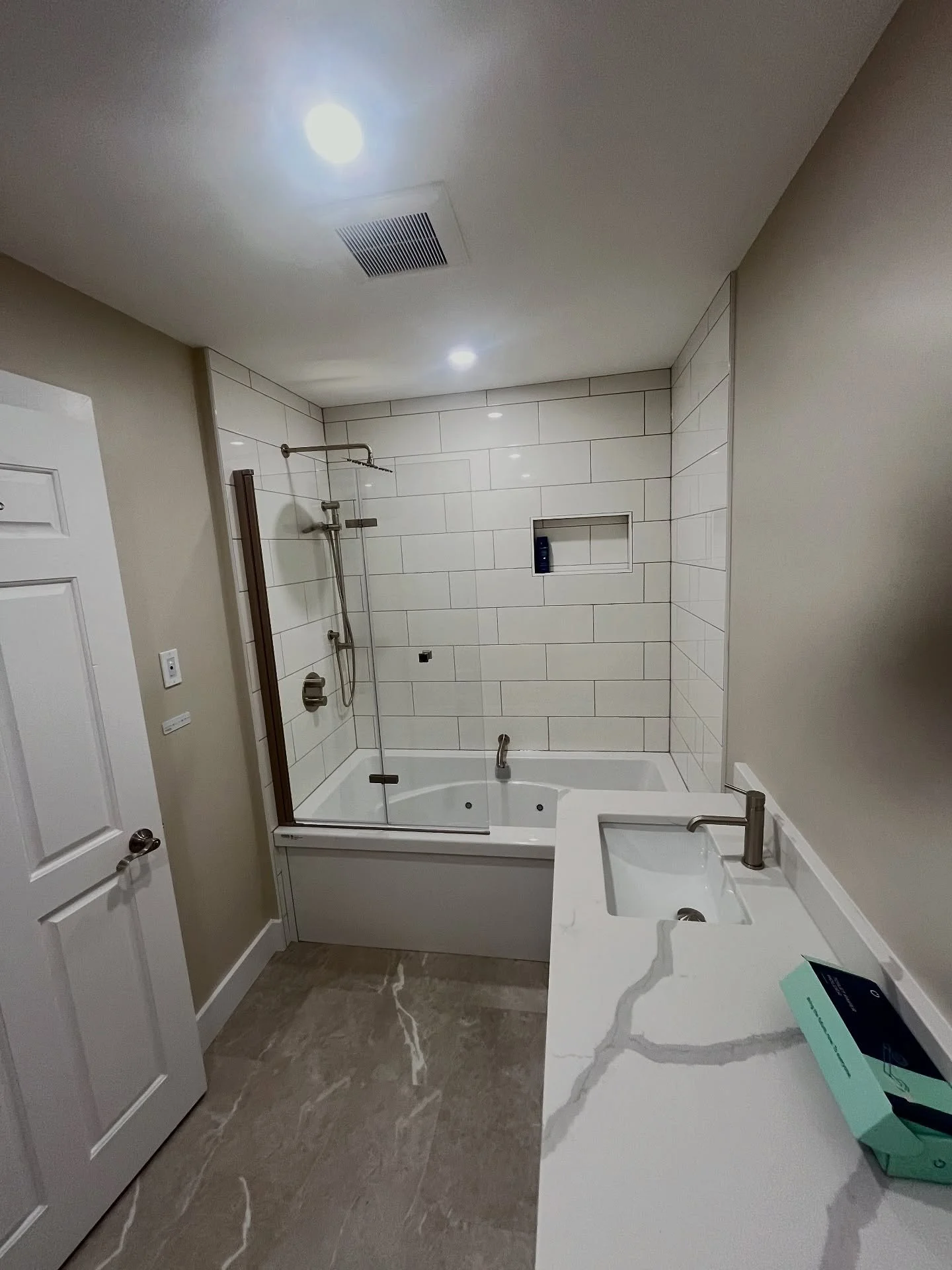 Paint on a couple bathroom renovations complete.