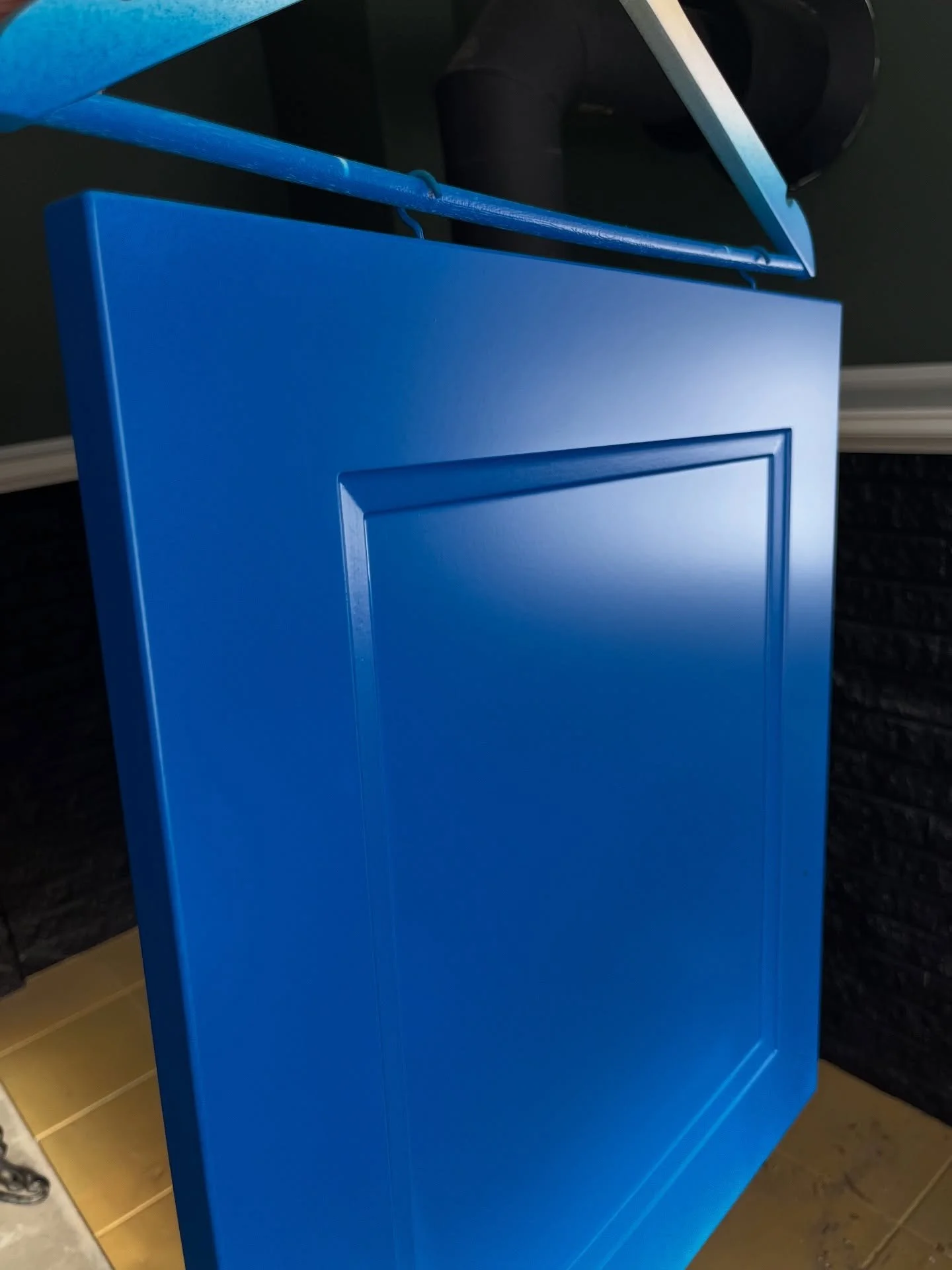 Some HVLP cabinet spraying.. bright blue in the middle of winter sure does feel right..