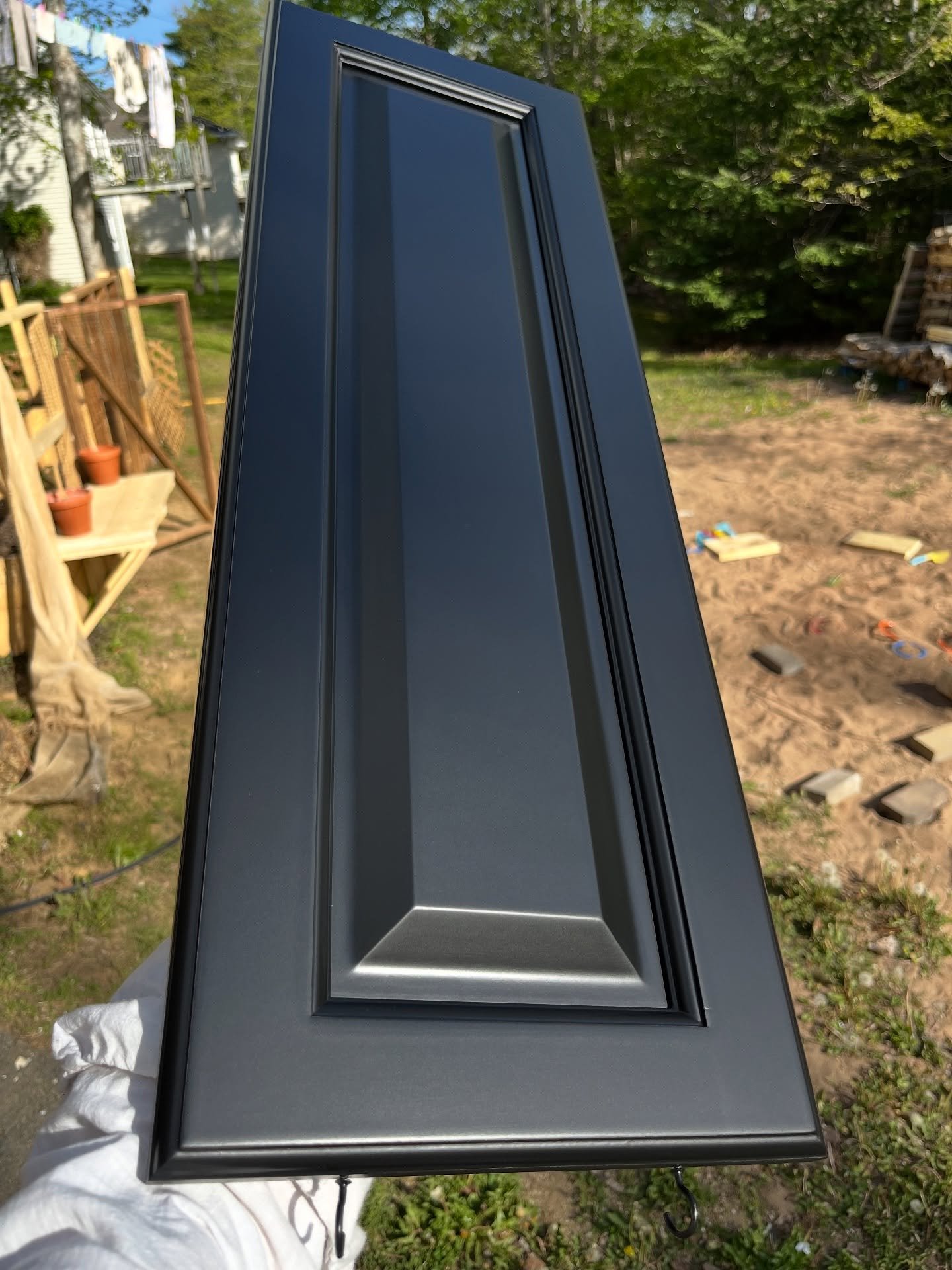Freshly sprayed cabinet door.