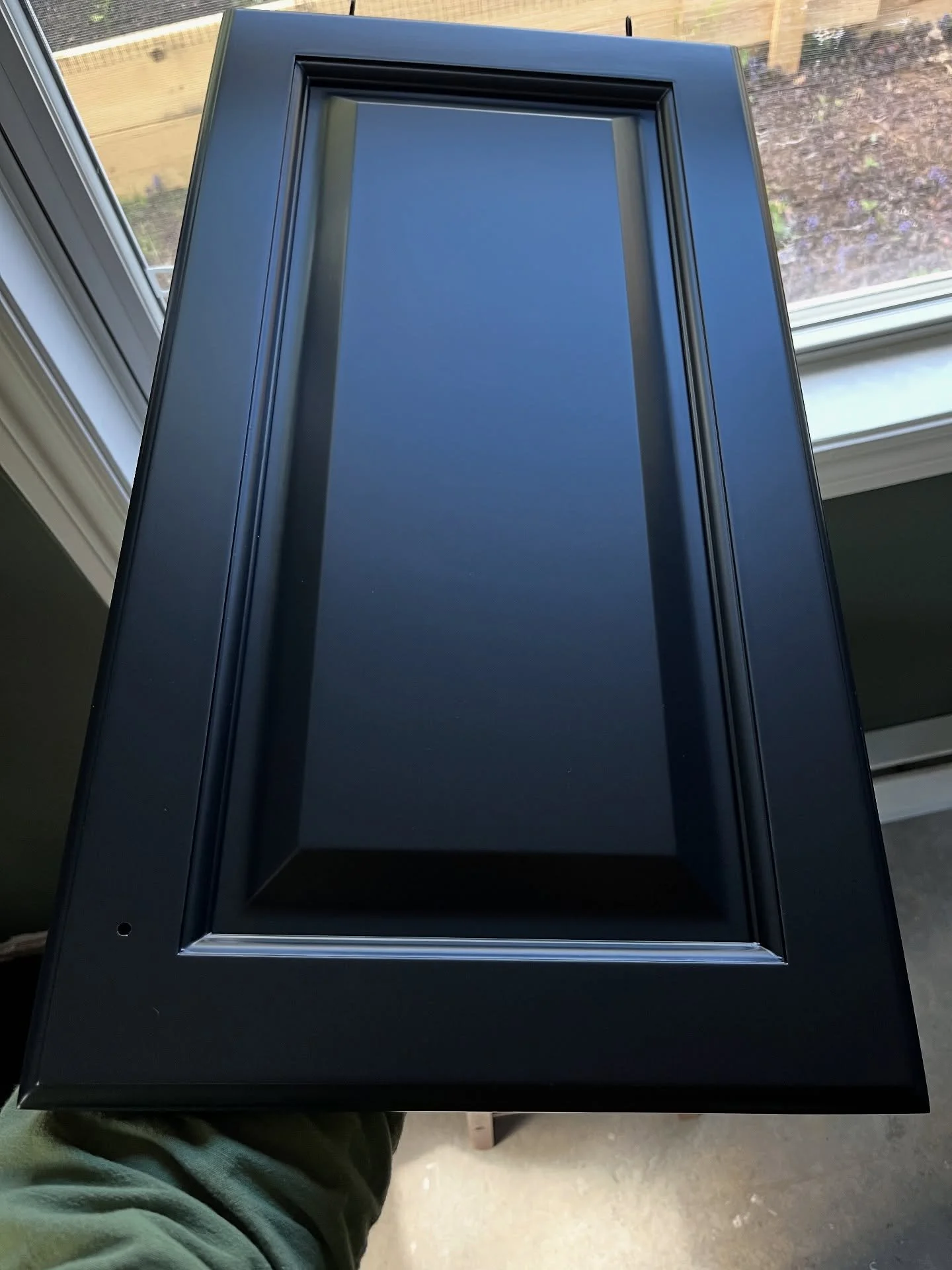 More black cabinet doors as part of a two tone kitchen cabinet/island makeover as well as a two tone staircase make over.