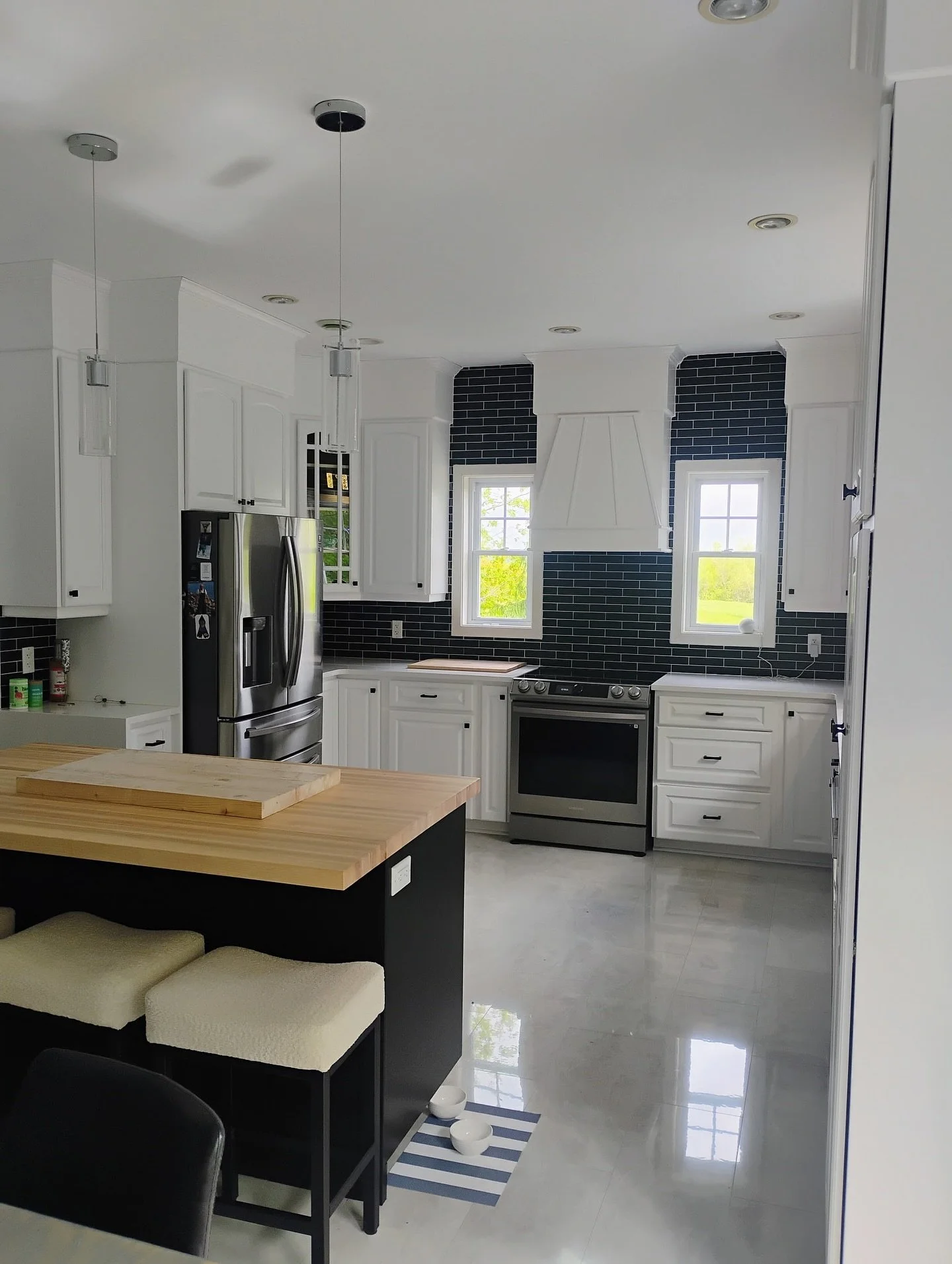 Freshly completed kitchen two-tone kitchen cabinet and staircase make over!!! Done.