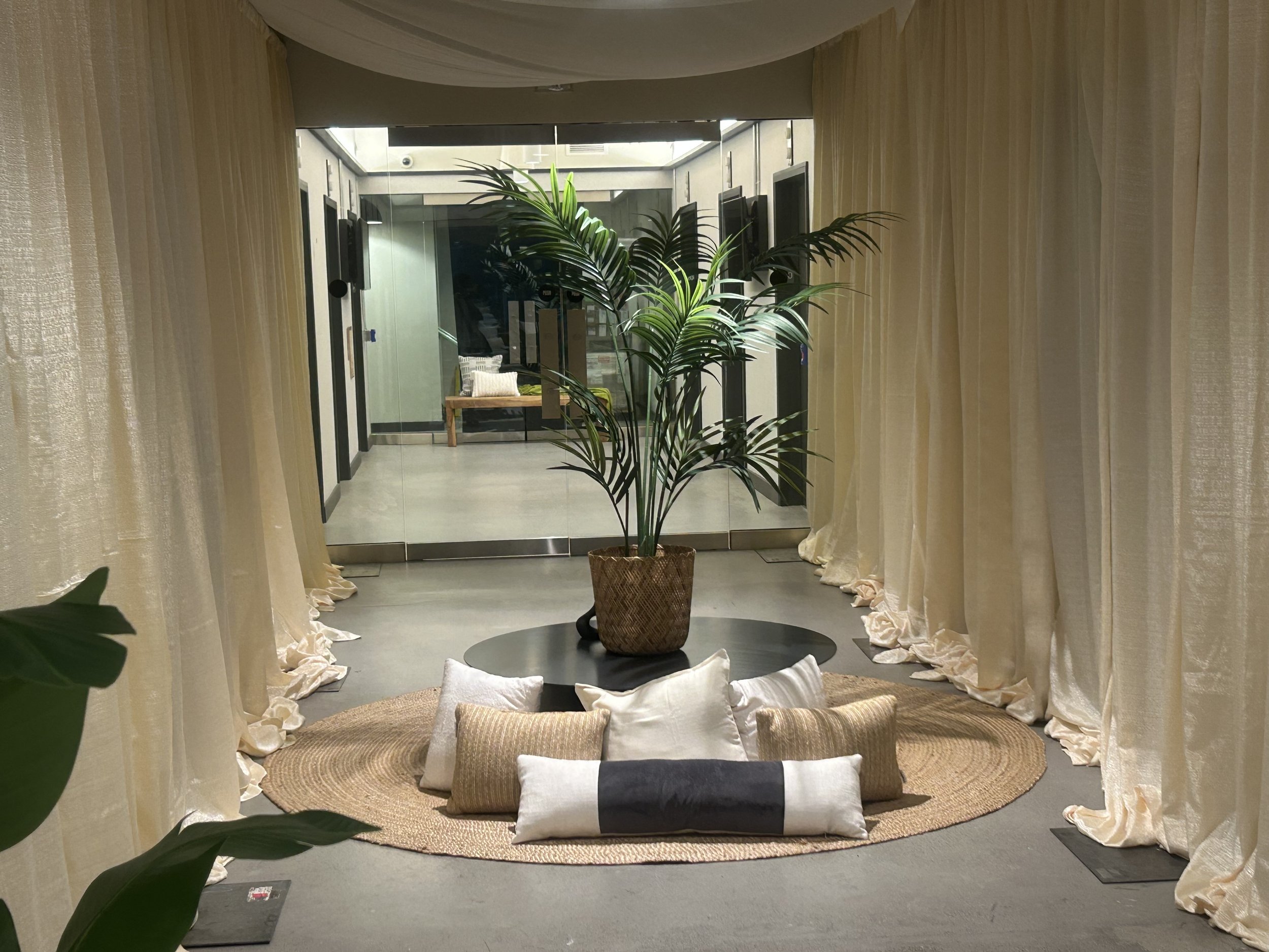 Entrance to retreat- pillows and flowy drapes