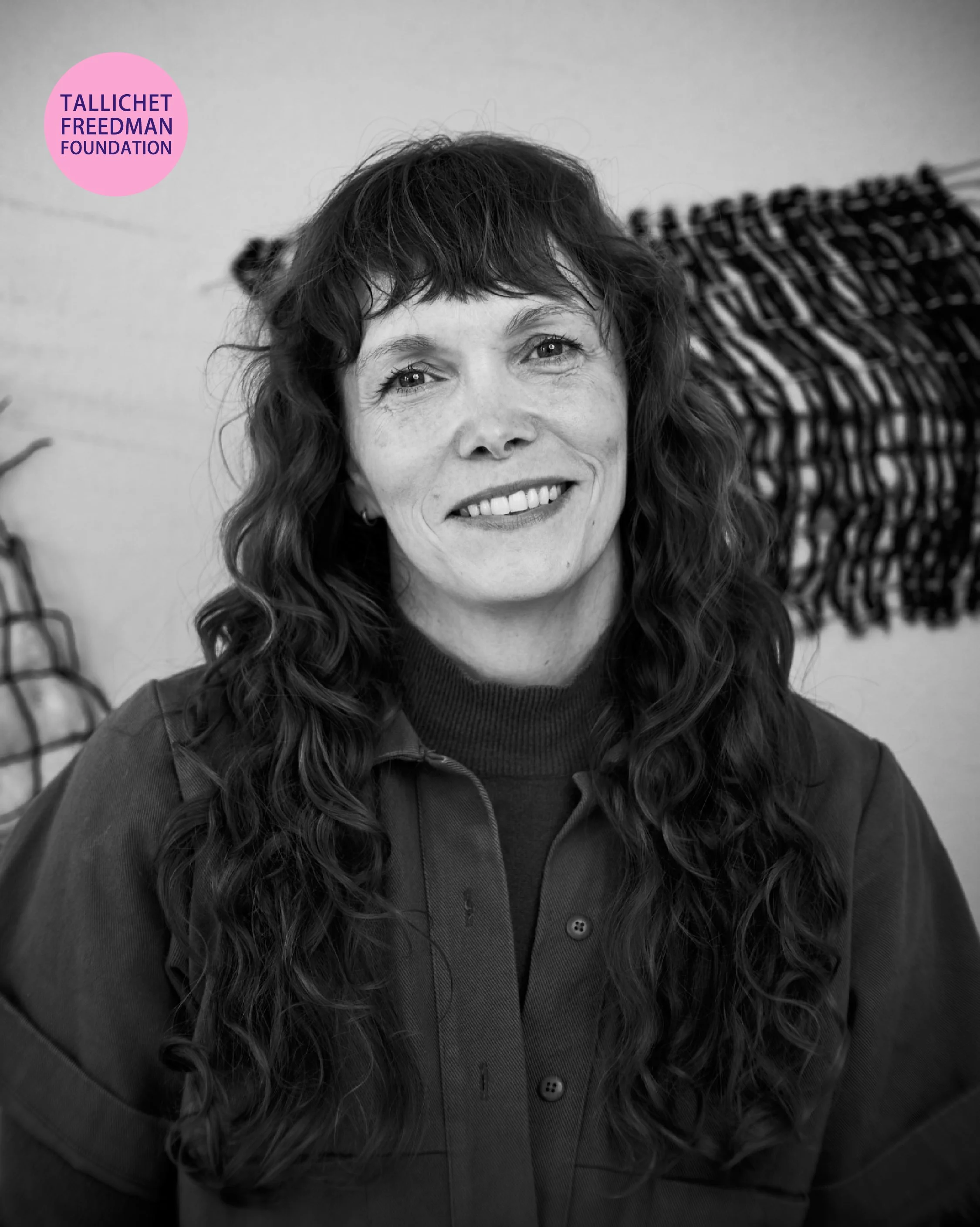 Queens artist Courtney Childress in a close-up portrait during a filmed studio interview discussing her artistic practice.