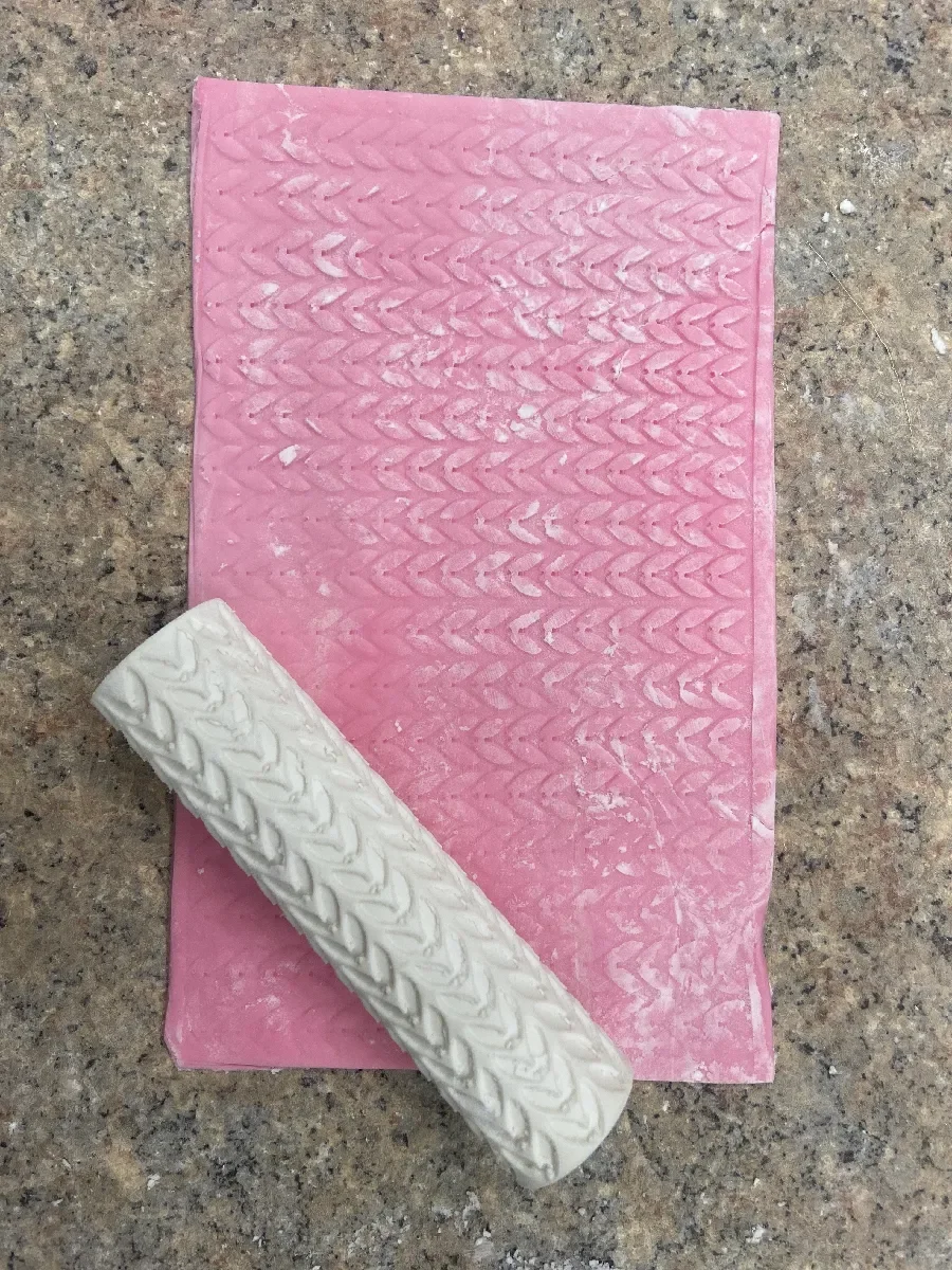 Sweater shape pattern roller.webp