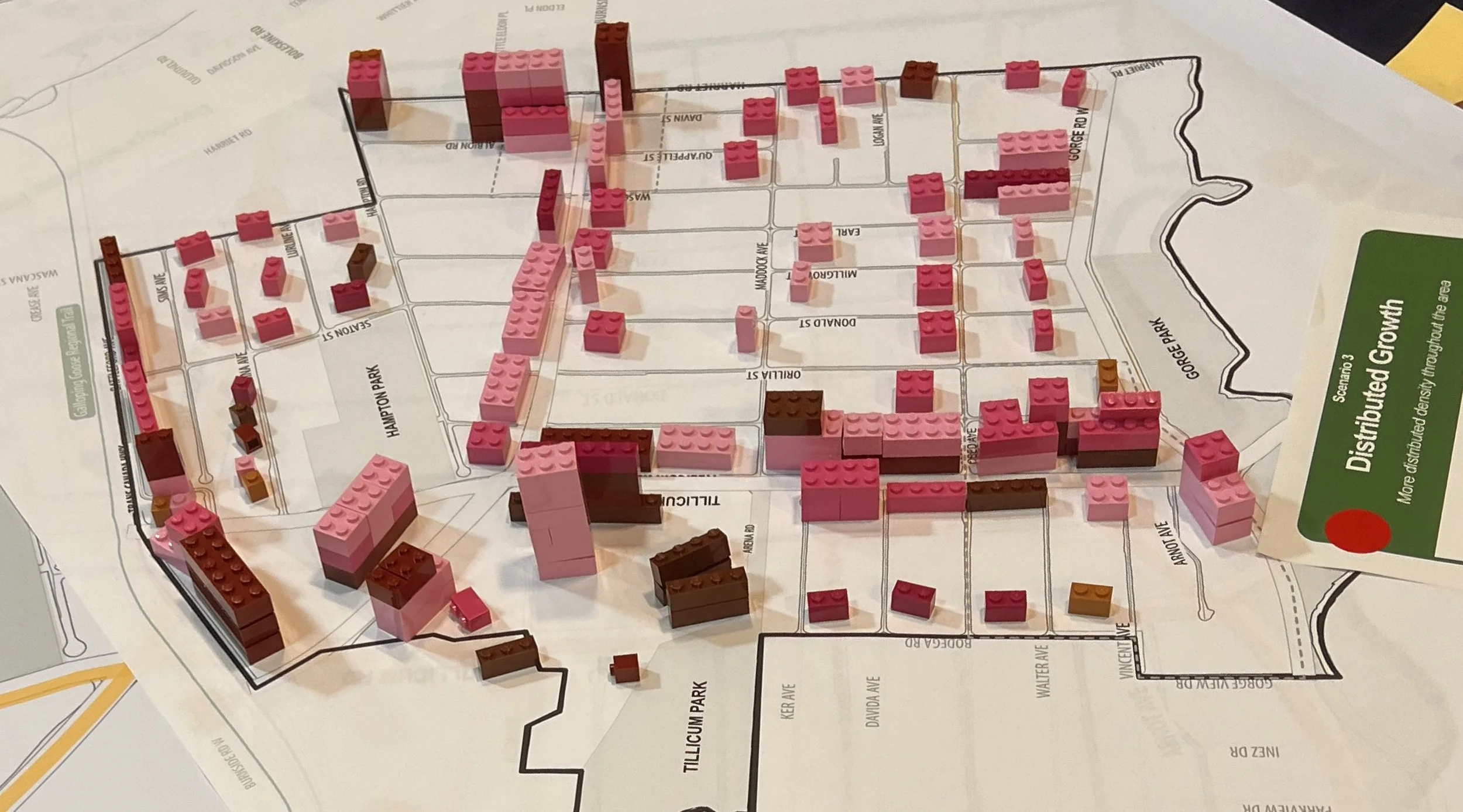  Activity with LEGO blocks: blocks of different sizes used to represent small, medium, large buildings, with varying heights — placed on a map of Tillicum. 
