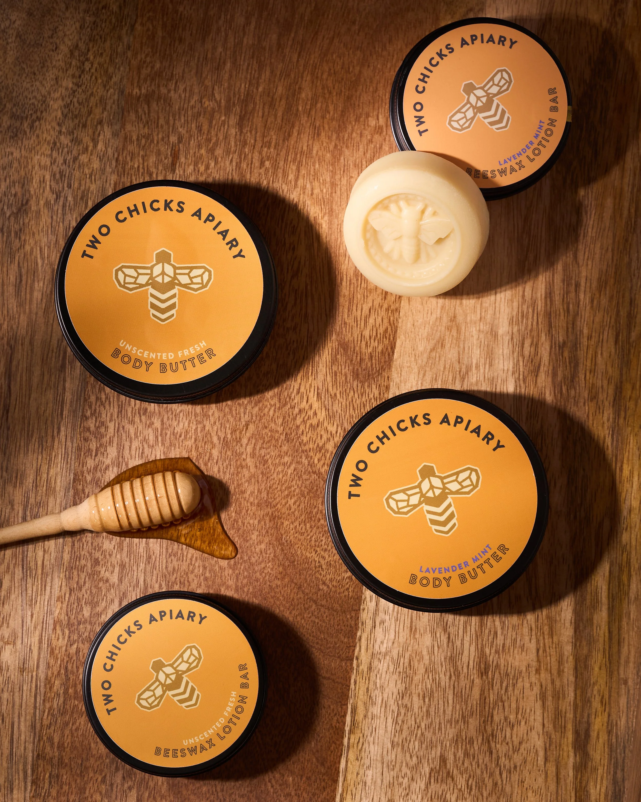 (11_25)TwoChicksApiary_LotionBar_BodyButter_5GroupShot.jpg