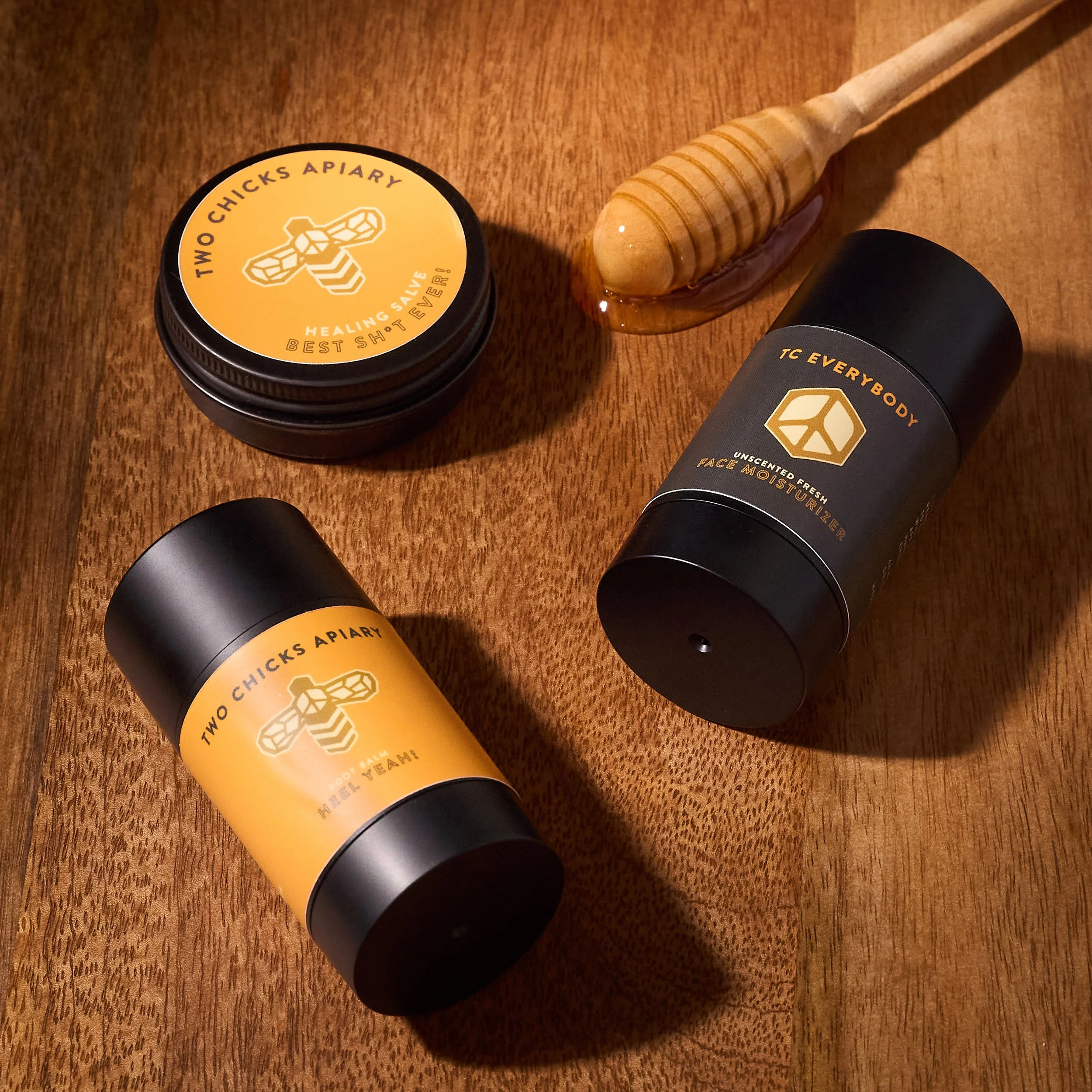 (11_25)TwoChicksApiary_HeelYeah_HealingSalve_FaceMoisturizer_5GroupShotjpg.jpg