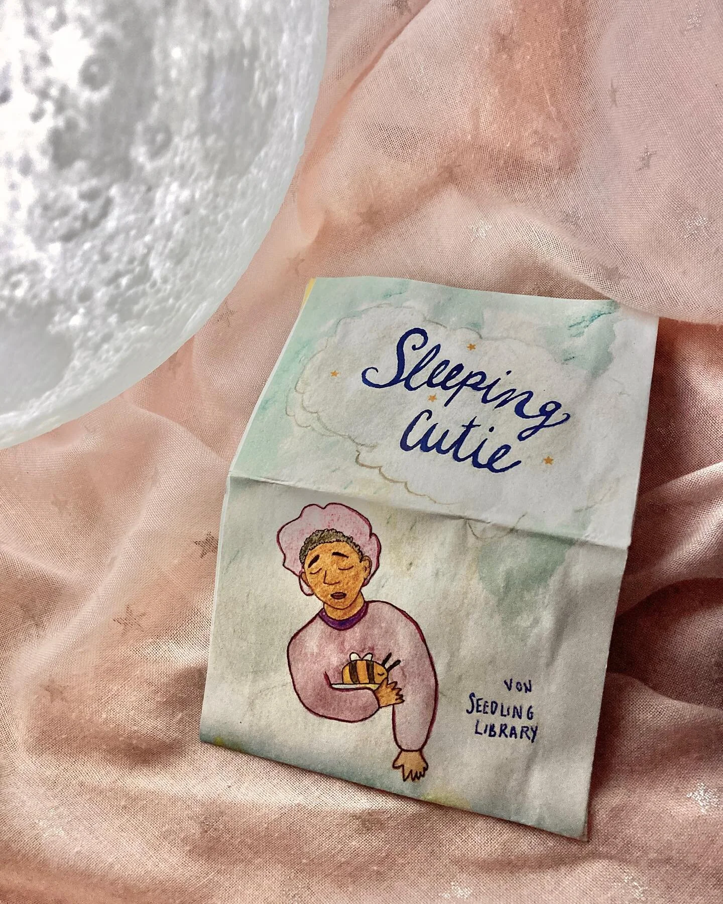 sleeping cutie ☁️✨😴

(video ID: Nicky&rsquo;s hands showing all the pages of the zine: a Black cutie resting on a cloud in various sleeping positions)

🌹 For this particular one, Black queer/trans/inter folks can DM me with their postal address and