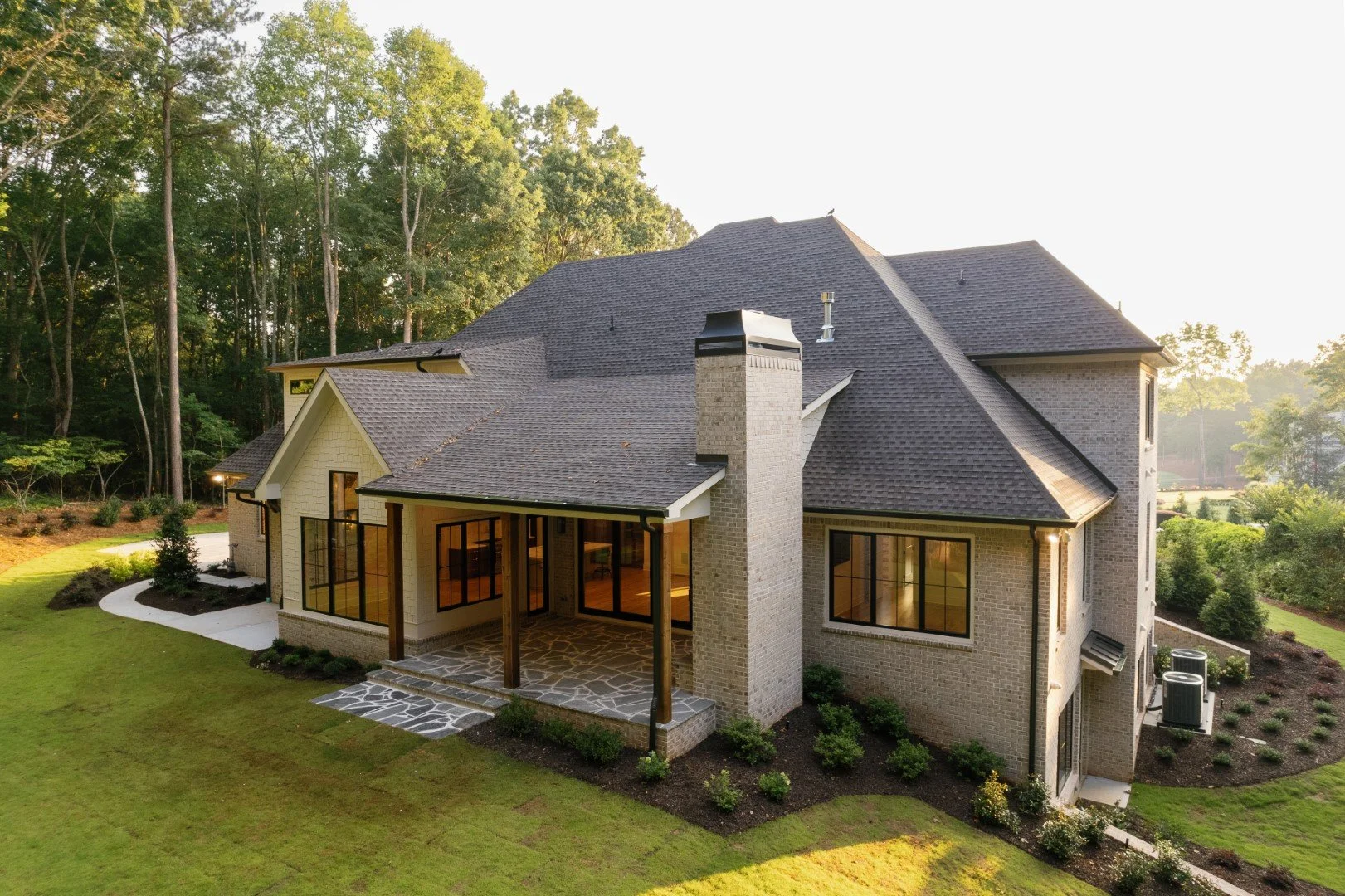 Luxury Custom Home by ADG Custom Homes in Hawks Ridge brick and stone exterior 6.jpg