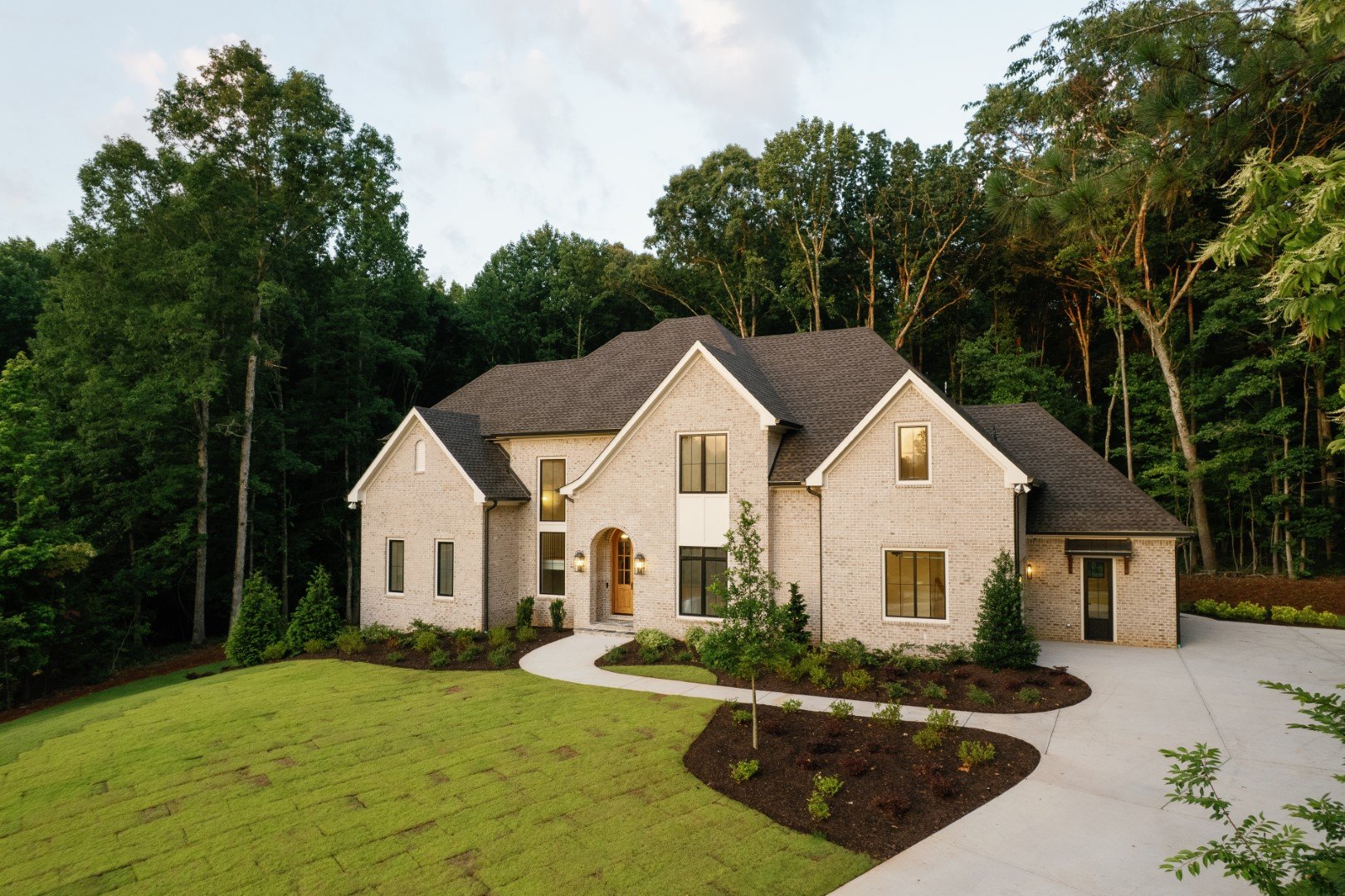 Luxury Custom Home by ADG Custom Homes in Hawks Ridge brick and stone exterior 2.jpg