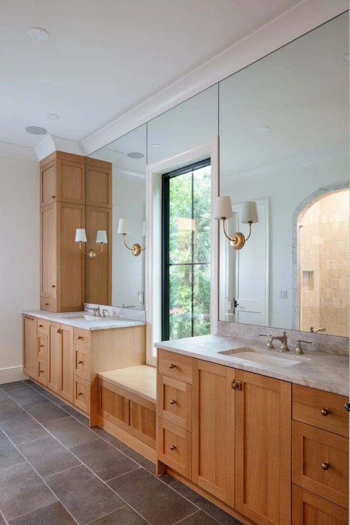 Luxury Custom Home by ADG Custom Homes in Hawks Ridge stone master bath with reeded white oak and mega mirror.jpg