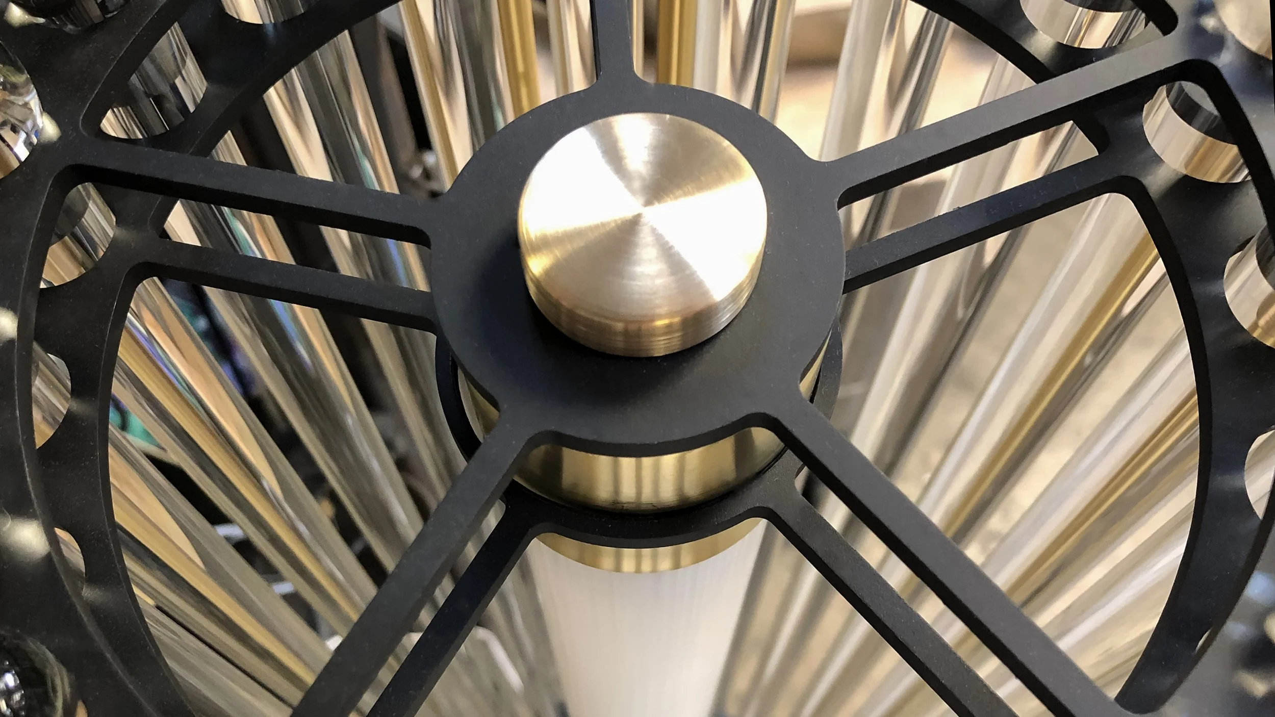 Tower Floor Lamp by Neptune Glassworks—floor-mounted fixture with stacked glass rods and machined brass plates, crowned with optical nodes that shimmer with light. Handcrafted in Los Angeles.