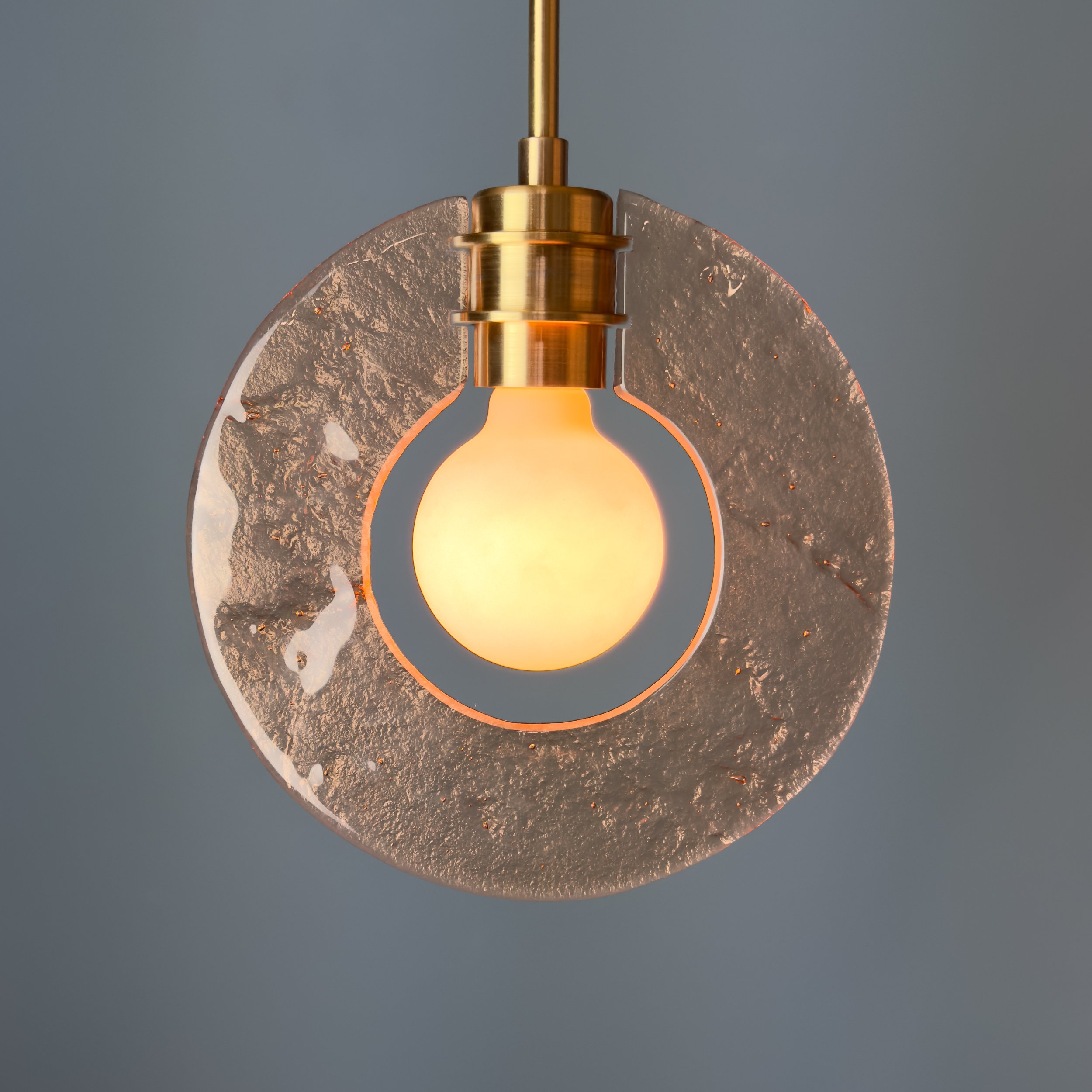 Auralith Pendant by Neptune Glassworks—custom sculptural lighting composition with brass framework and hand-blown Linen Glass elements, handcrafted in Los Angeles.