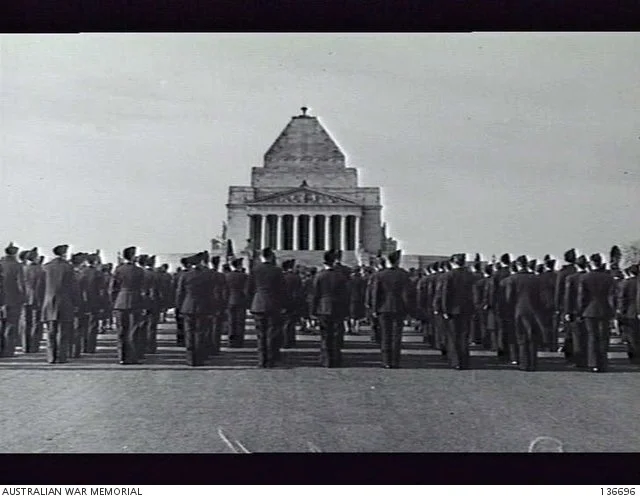 MELBOURNE, VIC. 1942-09-03. MEMBERS OF THE RAAF AND THE WOMEN'S AUXILIARY AUSTRALIAN AIR FORCE (WAAAF) LINED UP AT THE SHRINE OF REMEMBRANCE FOR THE WAR ANNIVERSARY SERVICE.