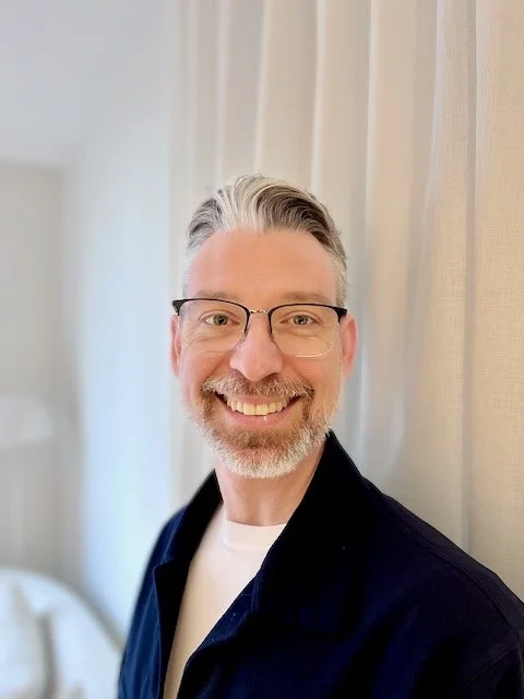 John Lyons, who manages enquiries and appointments at Lionheart Psychology in Melbourne.