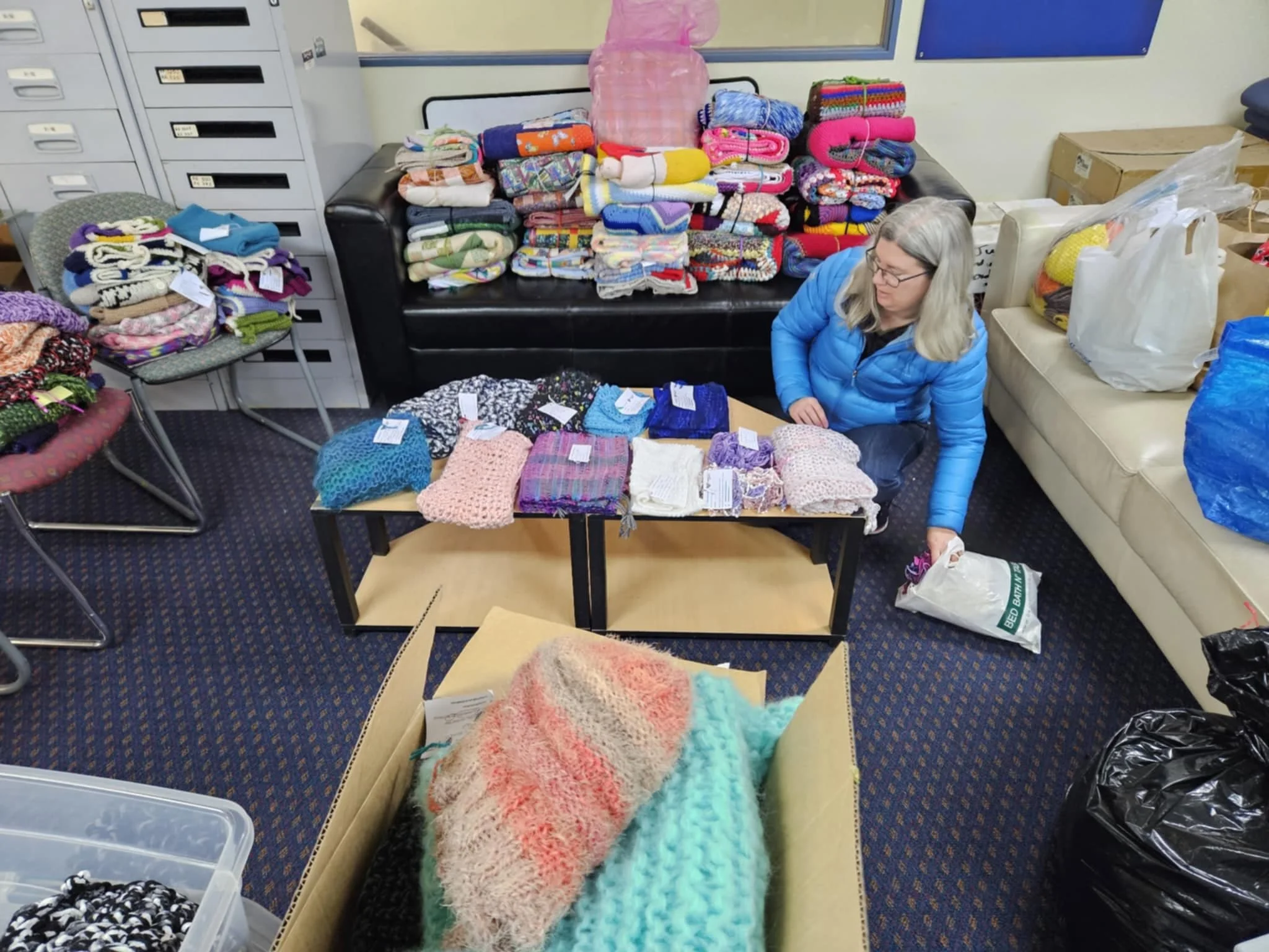 Louise sorts through donations