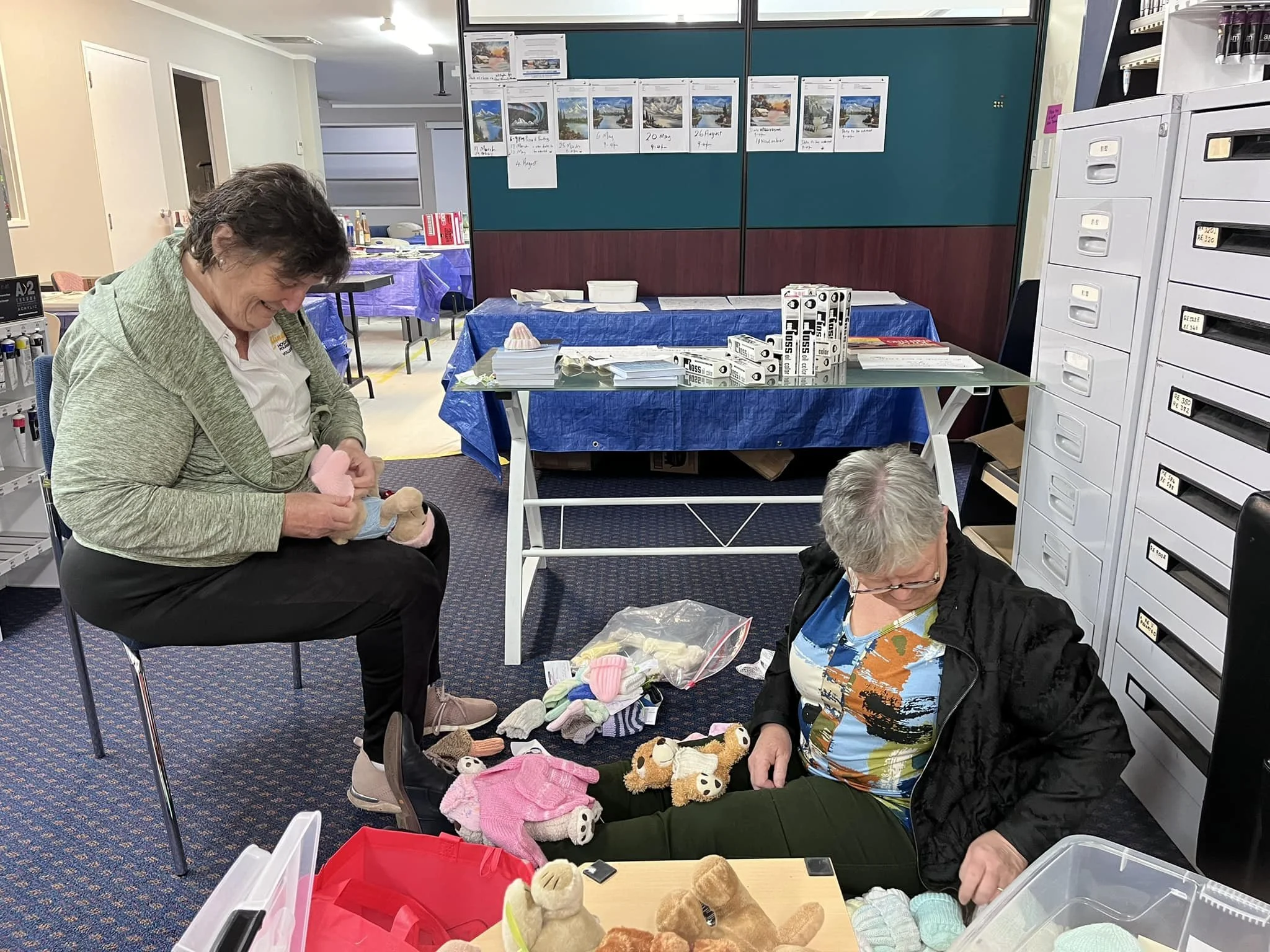 Women sort donated items
