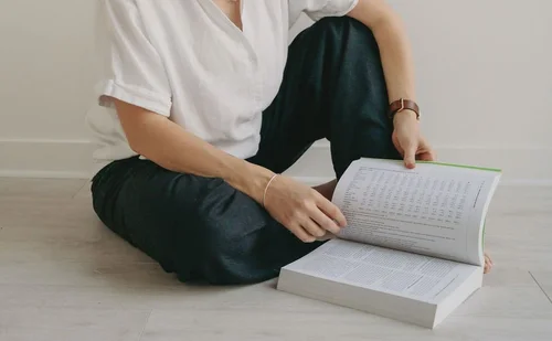 Jade reading a nutrition textbook