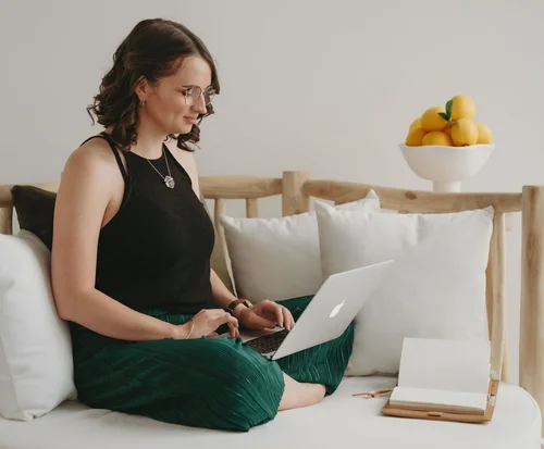 Jade working on her laptop
